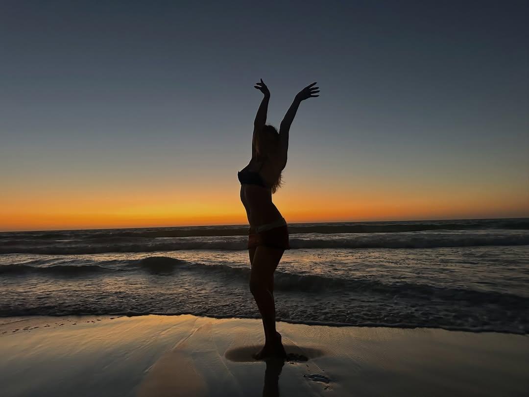 Addison Rae on the beach in Australia