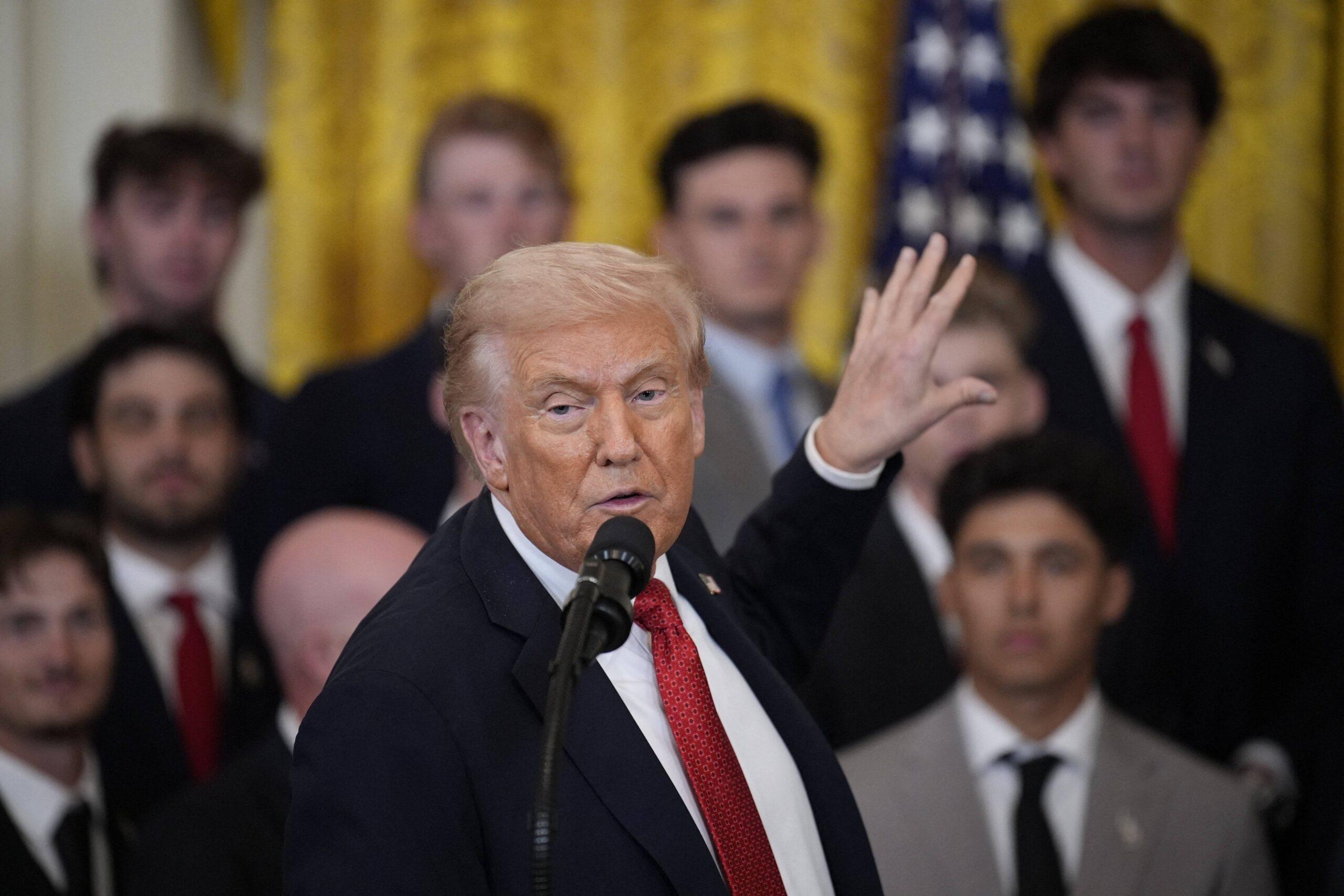 Donald Trump participating in a visit with the LSU and LSU Shreveport Baseball Champions