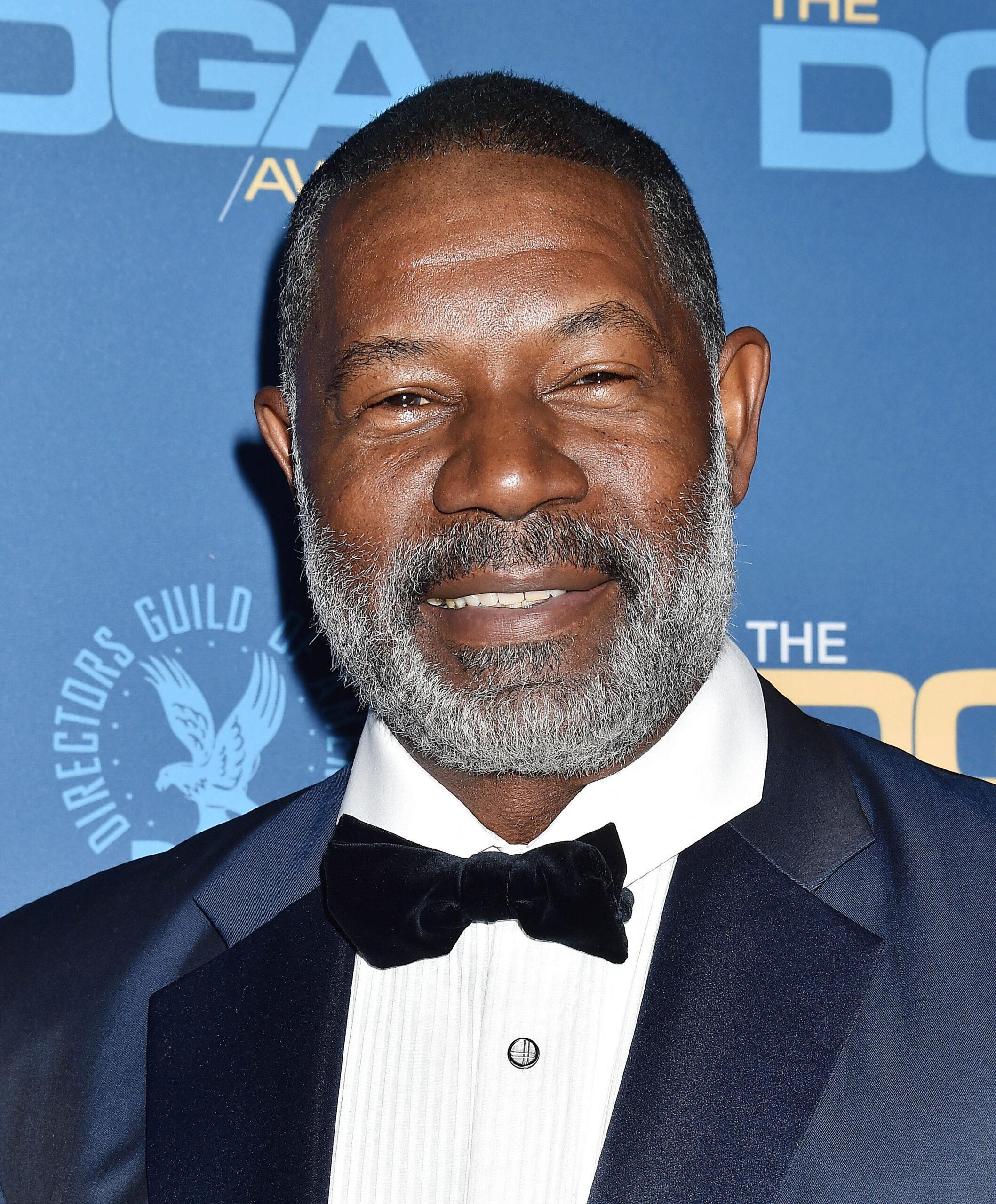 Dennis Haysbert posing on the red carpet. 