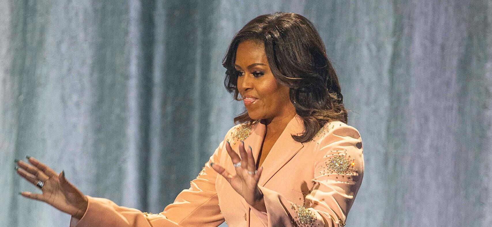 Michelle Obama speaking during an event.