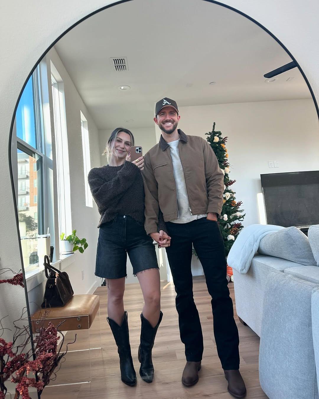Nicole Faith and her husband take mirror selfie