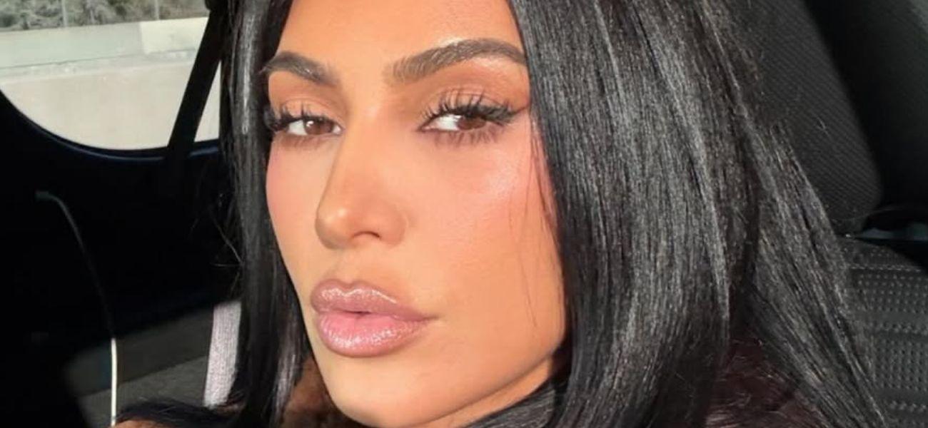 Kim Kardashian takes selfie in a car