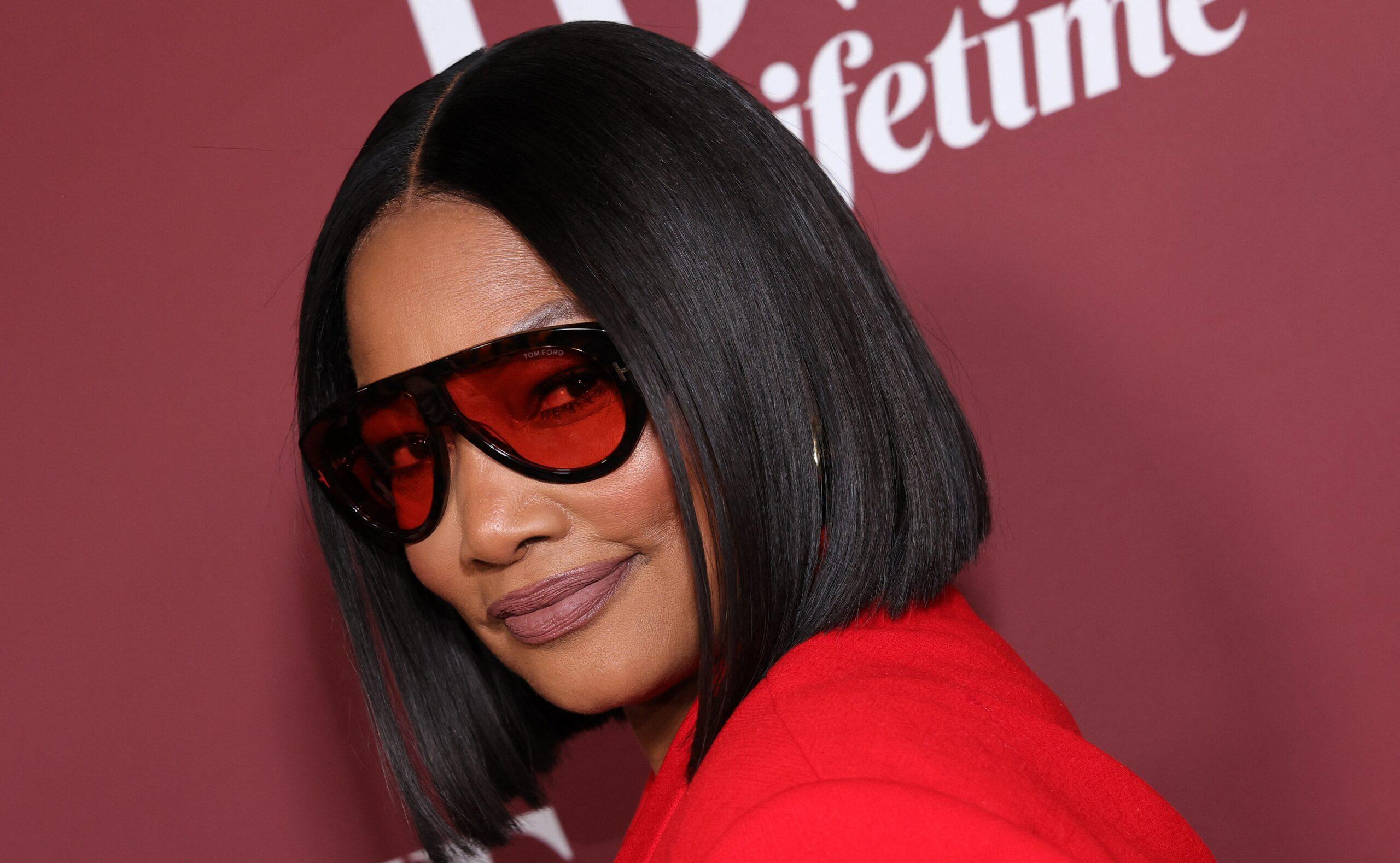 Garcelle Beauvais posing on the red carpet. 