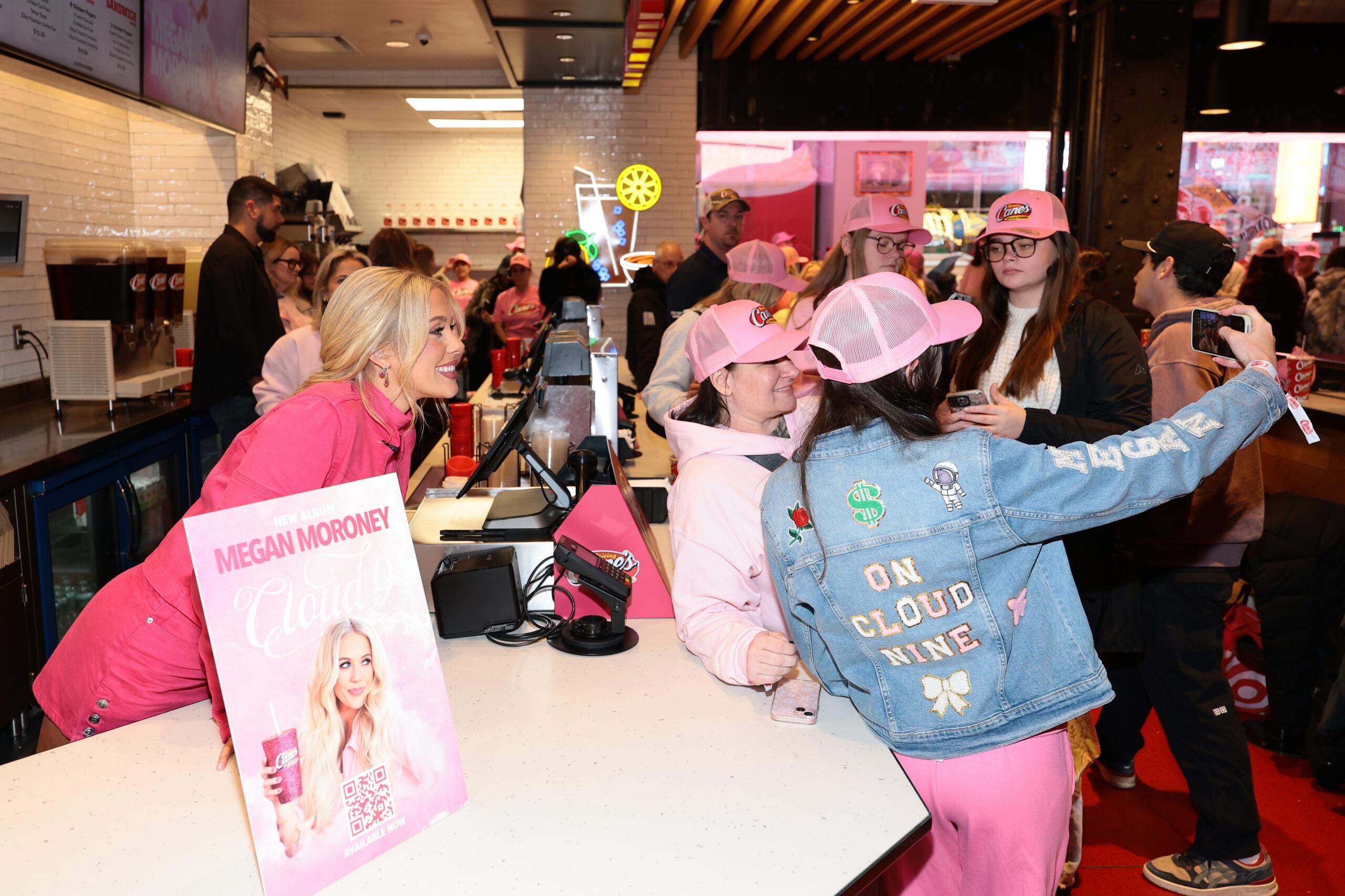 Megan Moroney Surprises Fans With Listening Event At Raising Cane's Times Square Global Flagship To Celebrate Cloud 9 Release