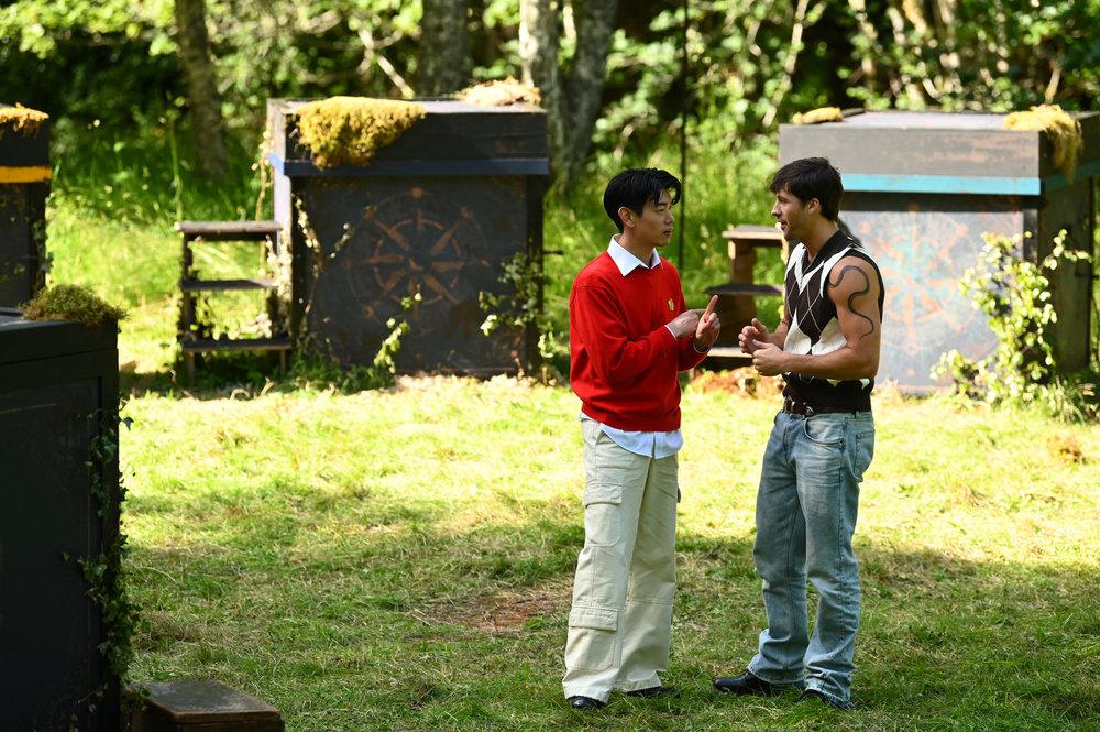 Rob Rausch and Eric Nam on "The Traitors." 