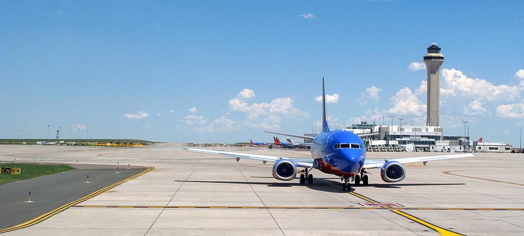 //px Plane_on_runway_at_Denver_International_Airport