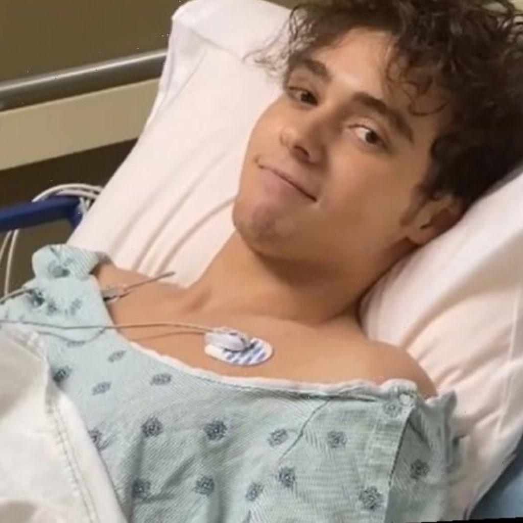 Joshua Bassett in a hospital gown and hospital bed