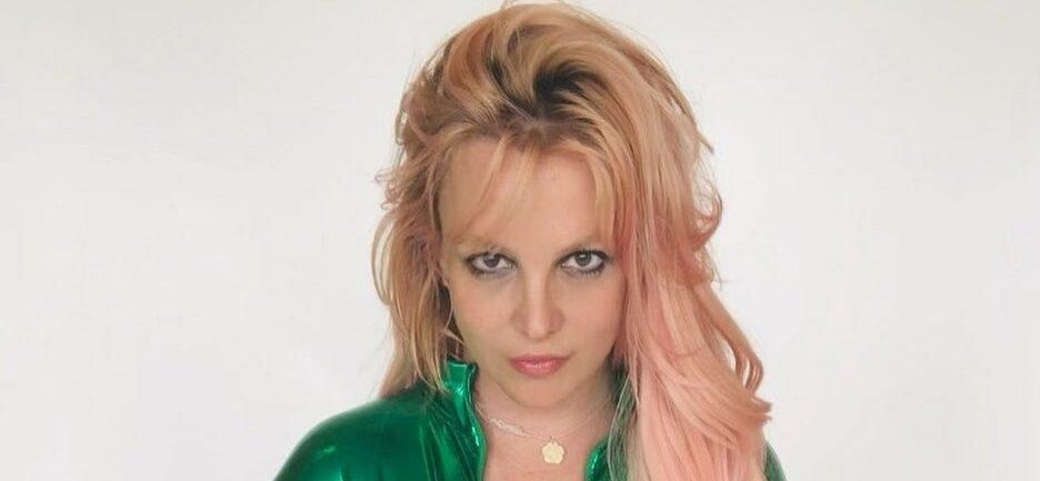 A photo of Britney Spears in a green jumpsuit