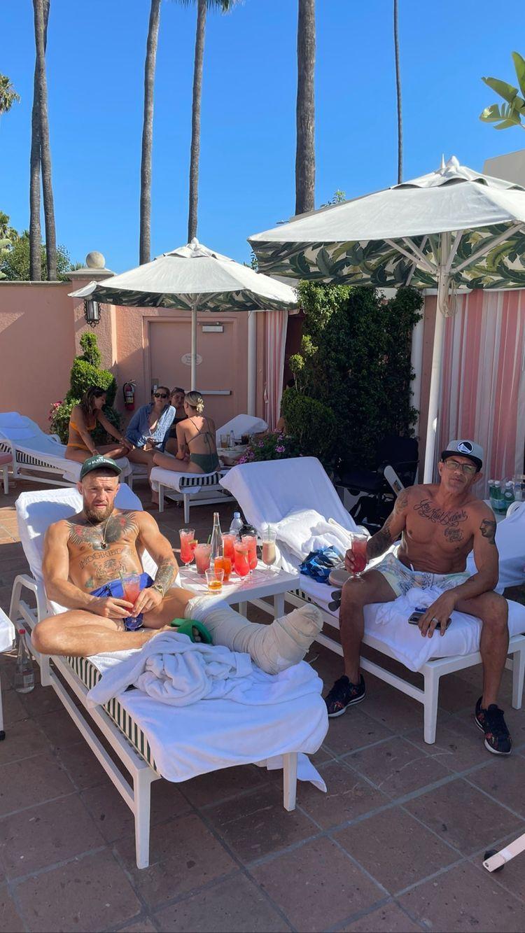 Conor McGregor Enjoys Cocktails By The Pool While Recovering From Leg Surgery