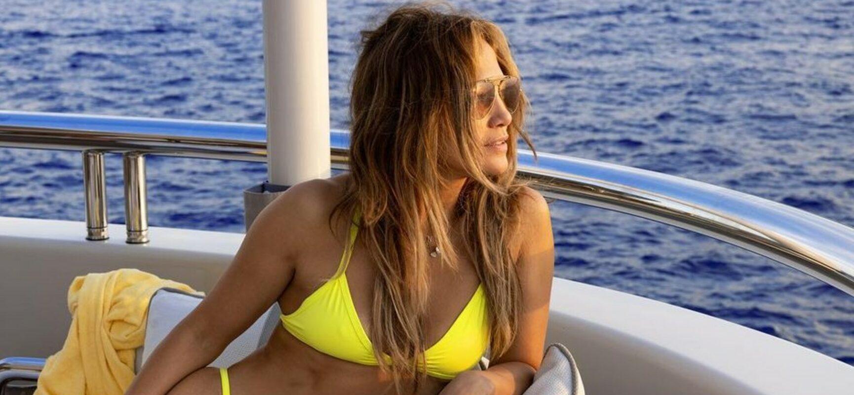 Jennifer Lopez rocks a yellow bikini.