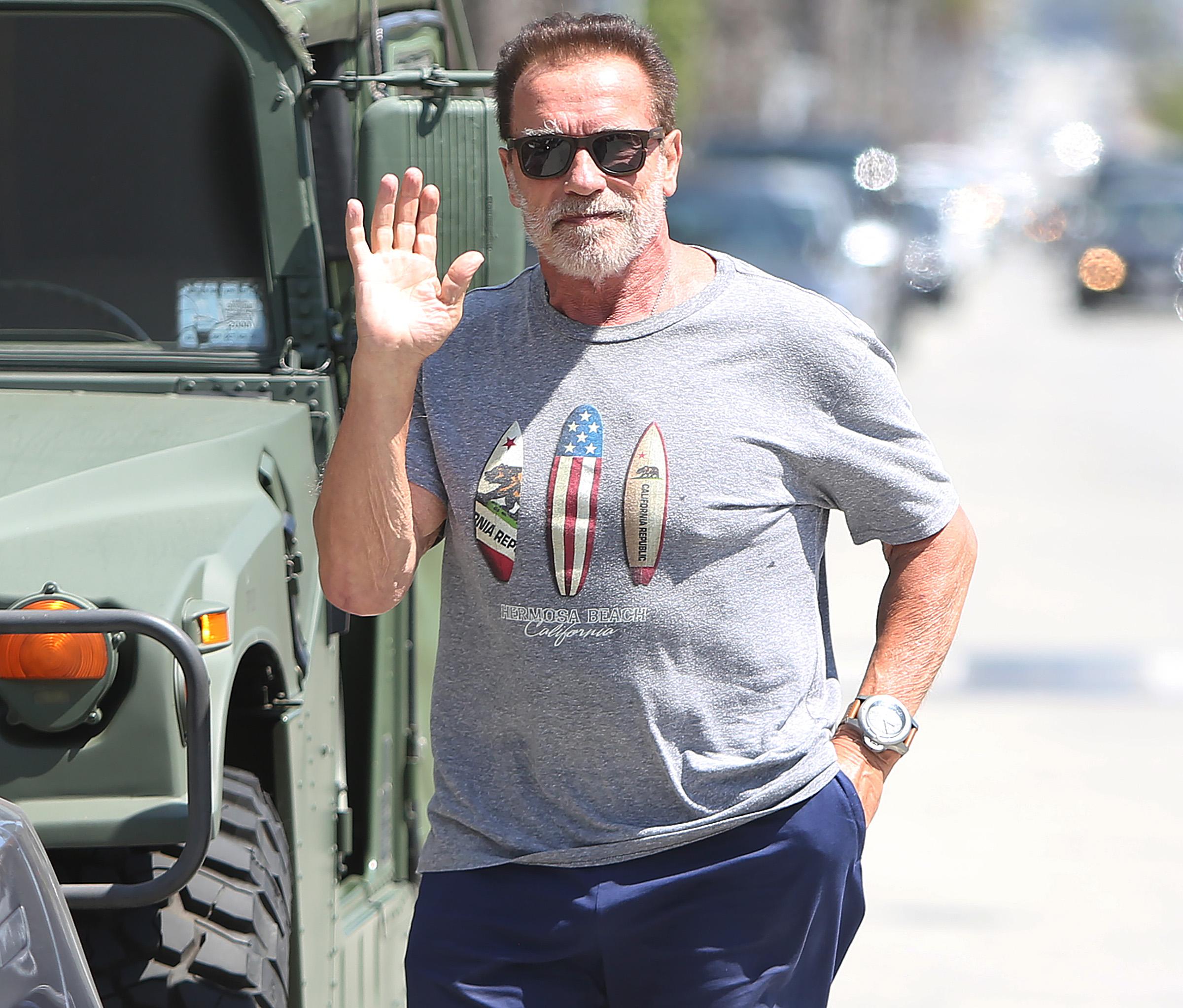 Actor Arnold Schwarzenegger riding his exotic hummer in Santa Monica