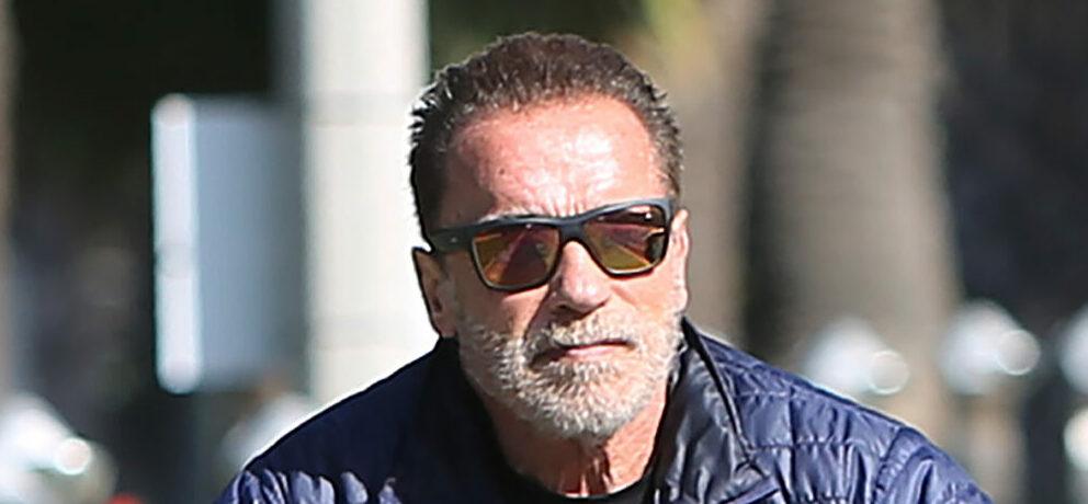 Arnold Schwarzenegger biking in Venice Beach after leaving GoldS Gym
