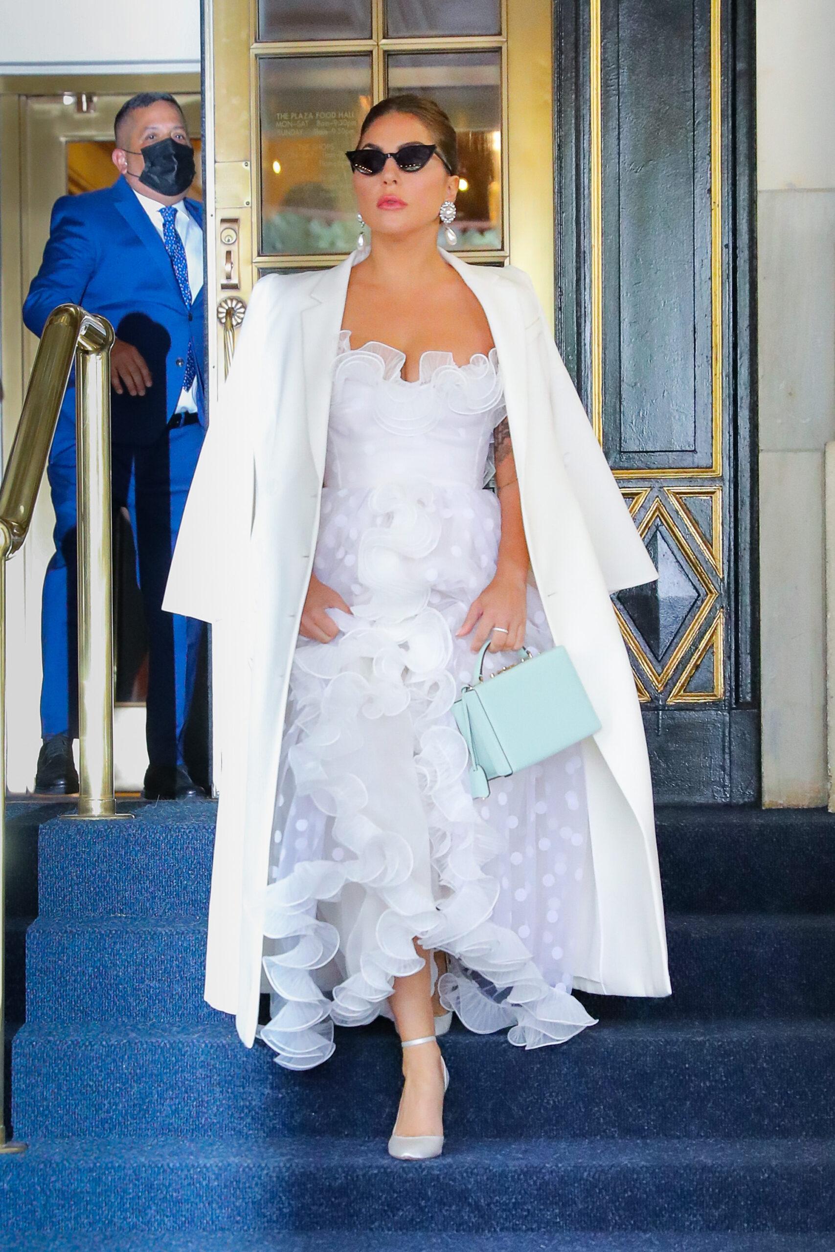 Lady Gaga seen wearing a white outfit as leaving her hotel in NYC