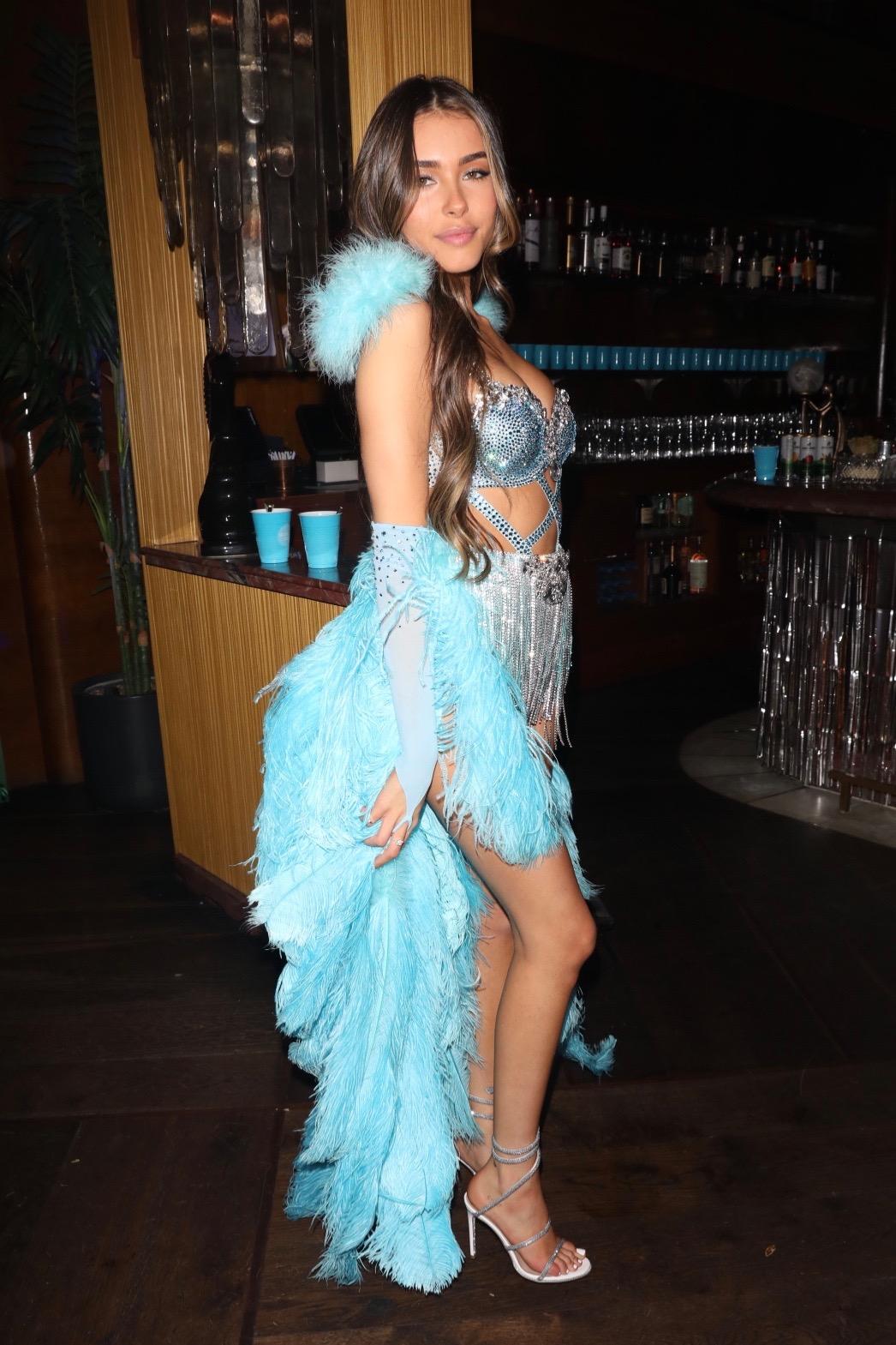 Madison Beer is seen celebrating her 21st birthday in a stunning baby blue sexy gown at Delilah
