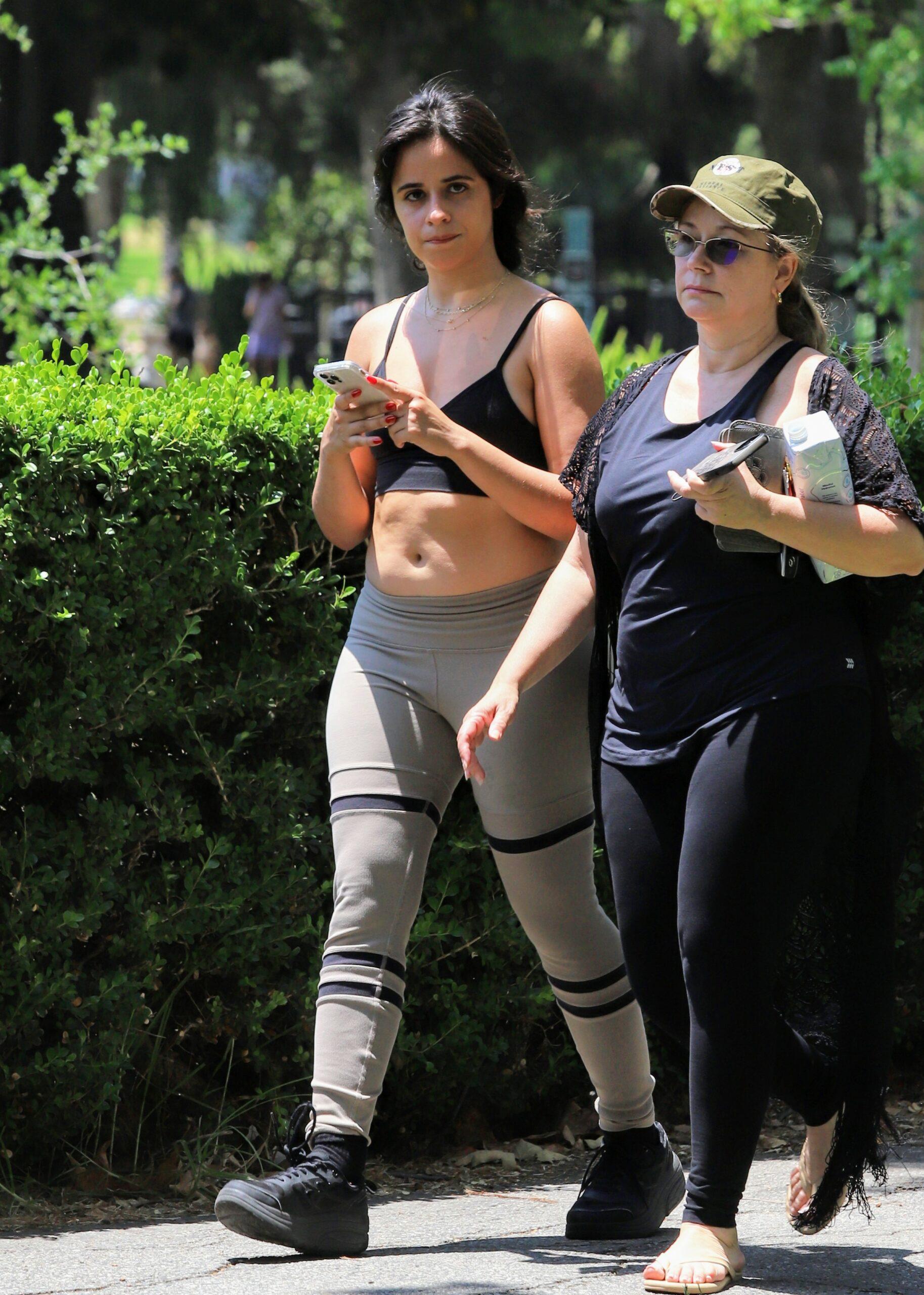 Camila Cabello seen getting excessive with her mother at the park in leggings and crop top