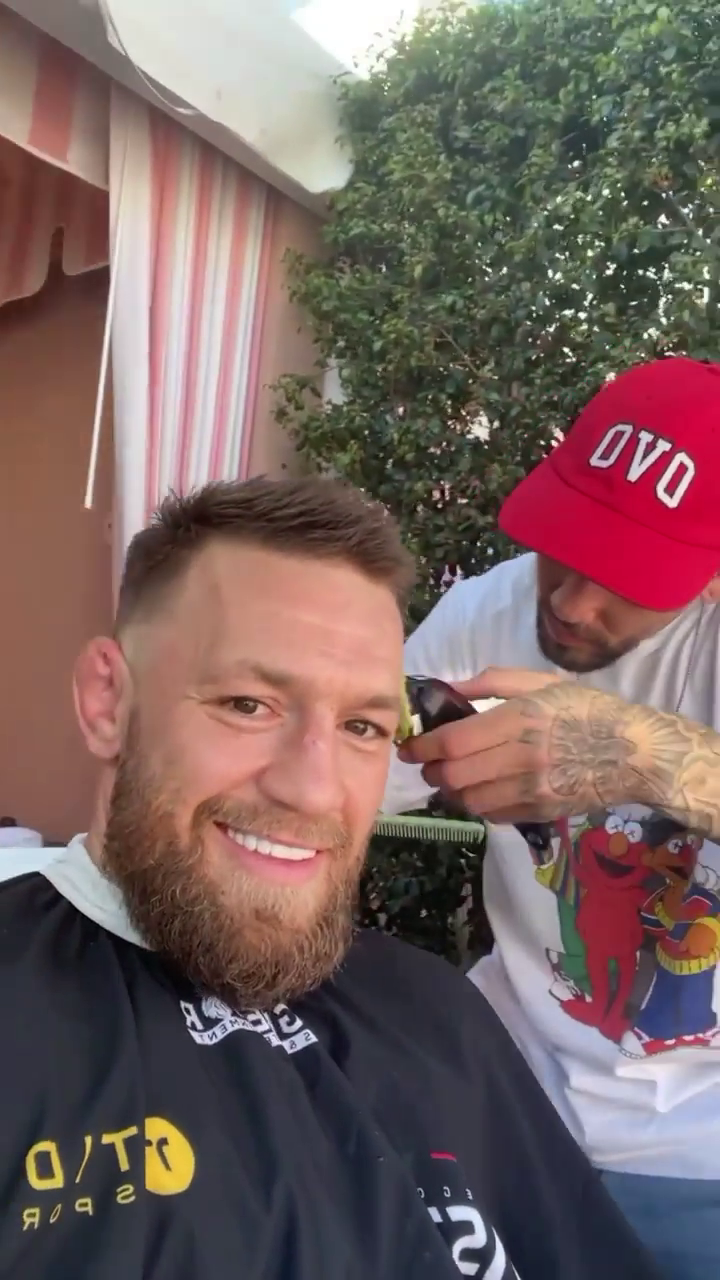 Conor McGregor Enjoys Cocktails By The Pool While Recovering From Leg Surgery