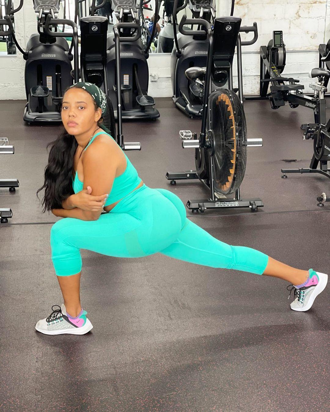Angela Simmons doing a lunge.