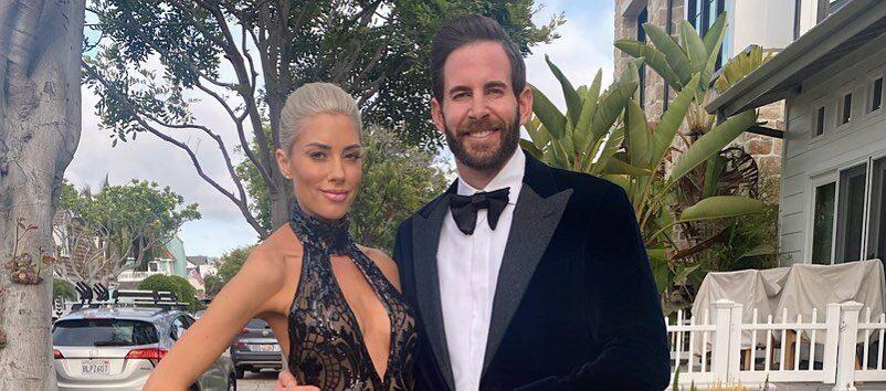 A lovely photo showing Tarek El Moussa and his fiancé' Heather Rae Young in dinner outfits.