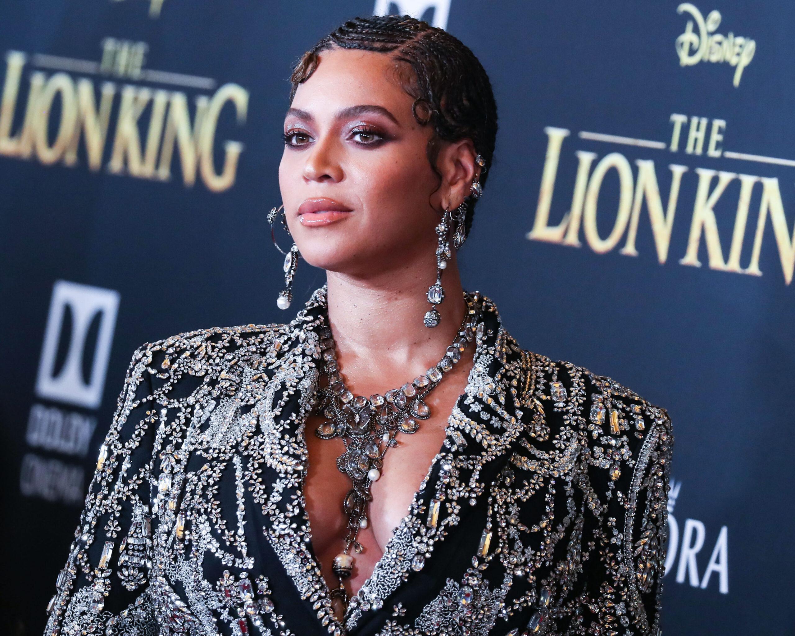 Beyonce Knowles Carter wearing an outfit by Alexander McQueen and Lorraine Schwartz jewelry arrives at the World Premiere Of Disney's 'The Lion King'