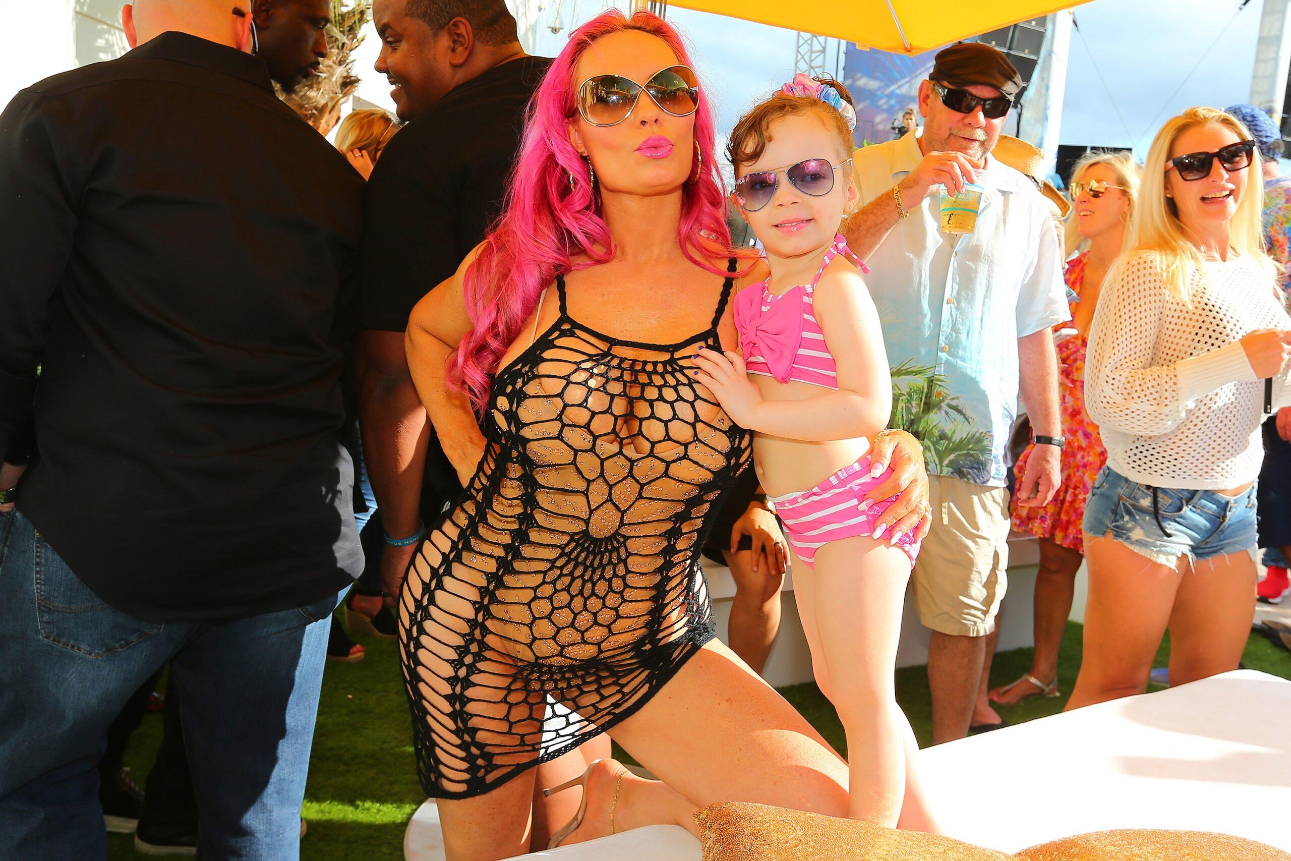 Ice-T along with his wife Coco and daughter Chanel Nicole, arrive in swimwear at the Tampa Bay Daylife party