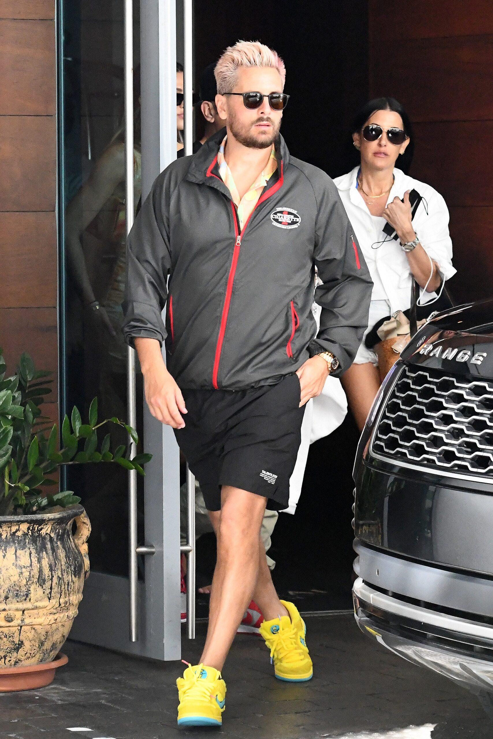 Scott Disick and Amelia Hamlin leave their hotel in Miami Beach