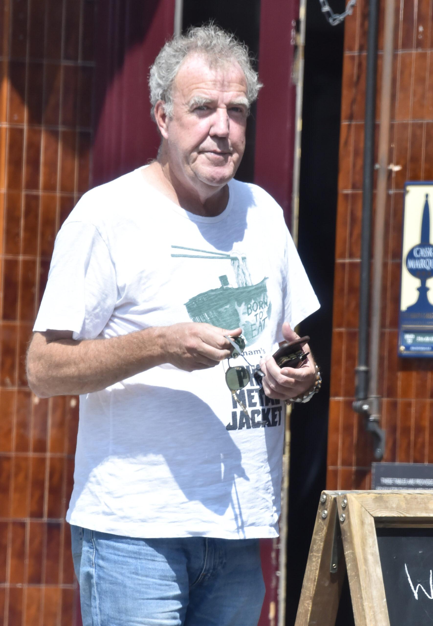 Jeremy Clarkson is seen knocking back the Vino outside the Walmer Castle pub in Notting Hill