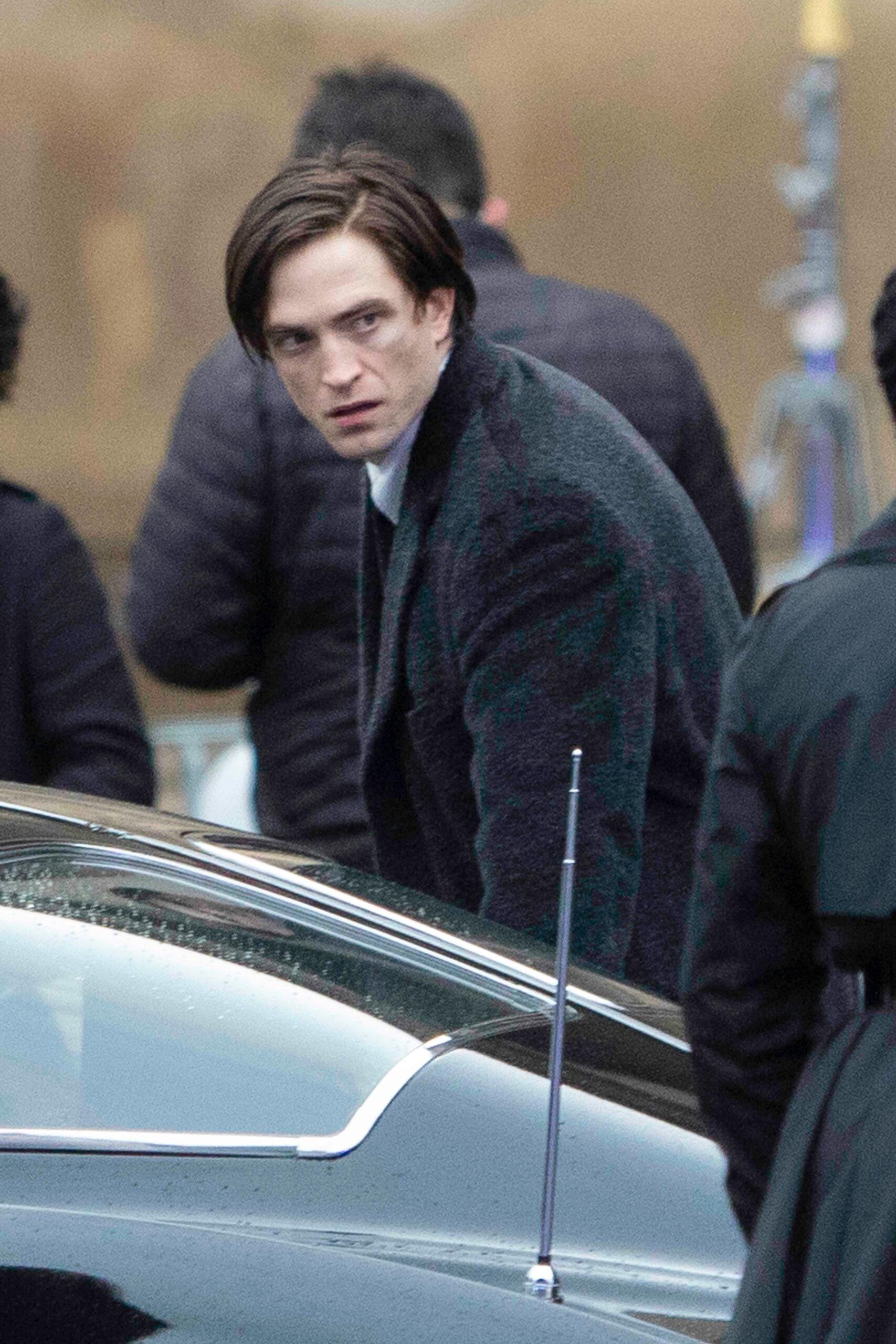 Robert Pattinson films dramatic scenes for The Batman outside St George apos s Hall in Liverpool