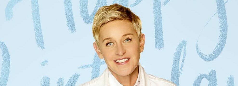 A photo showing Ellen DeGeneres in a white suit.