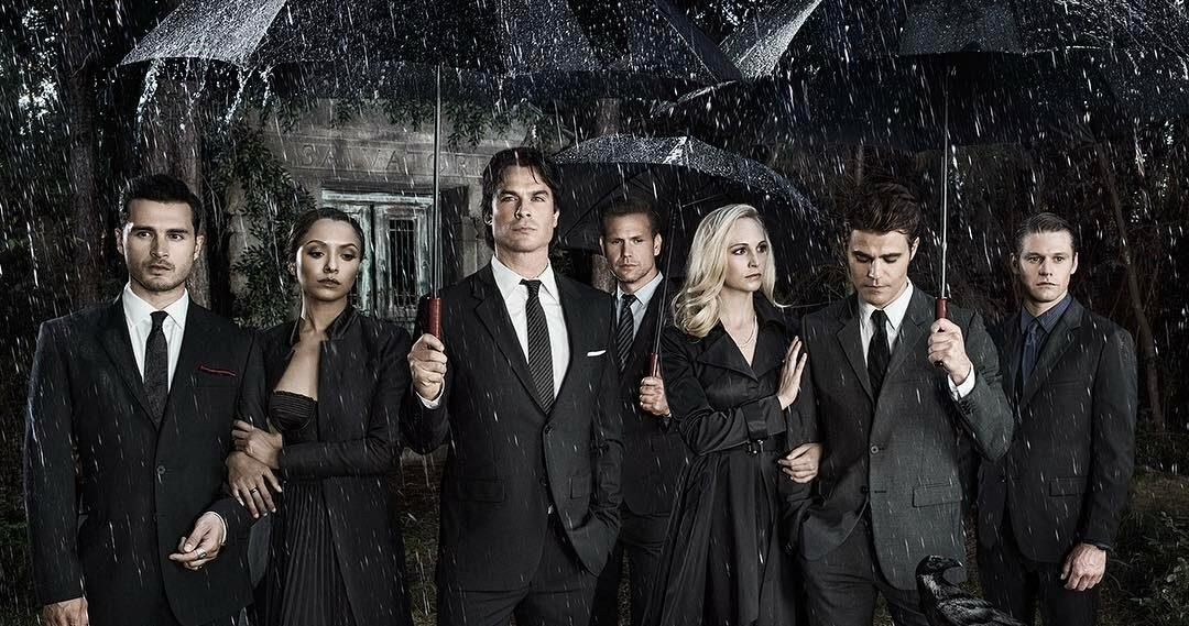 A photo showing the main cast of 'The Vampire Diaries' dressed in black clothing.