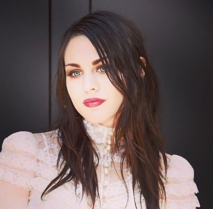 A beautiful looking Frances Bean Cobain sporting a pink net outfit.