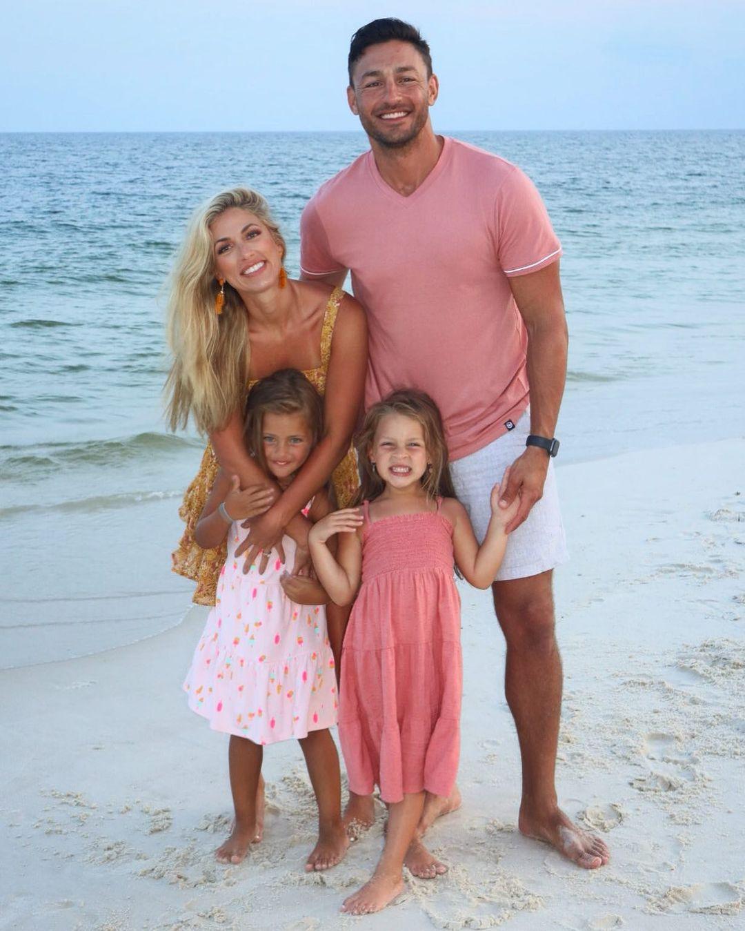 A photo showing the Raines family in casual outfits at the beach. 
