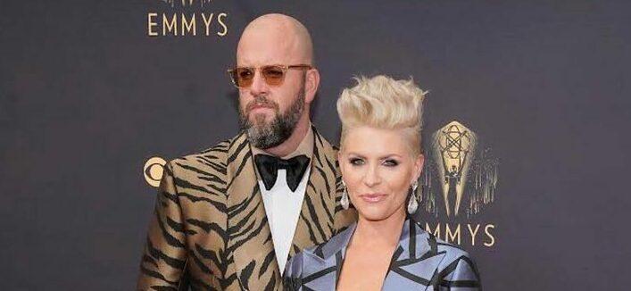A lovely photo showing Chris Sullivan and Rachel Sullivan in suits at the Emmy awards.