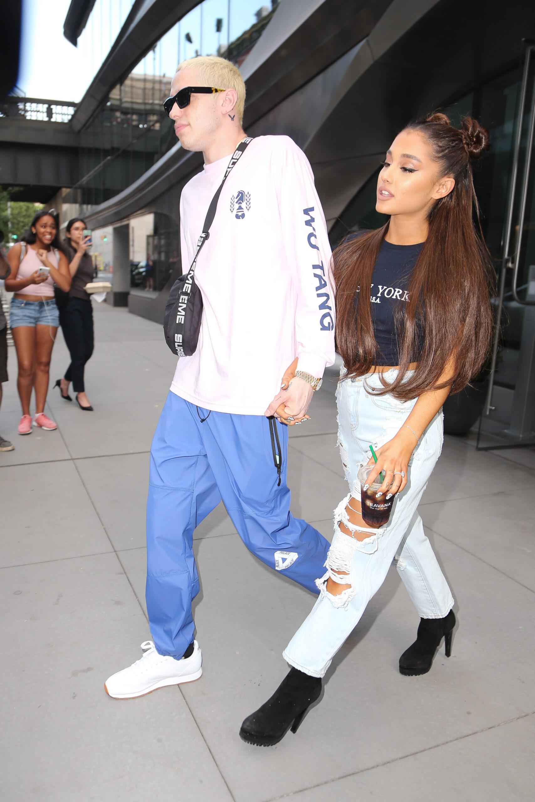 Pete Davidson holding hands with Ariana Grande