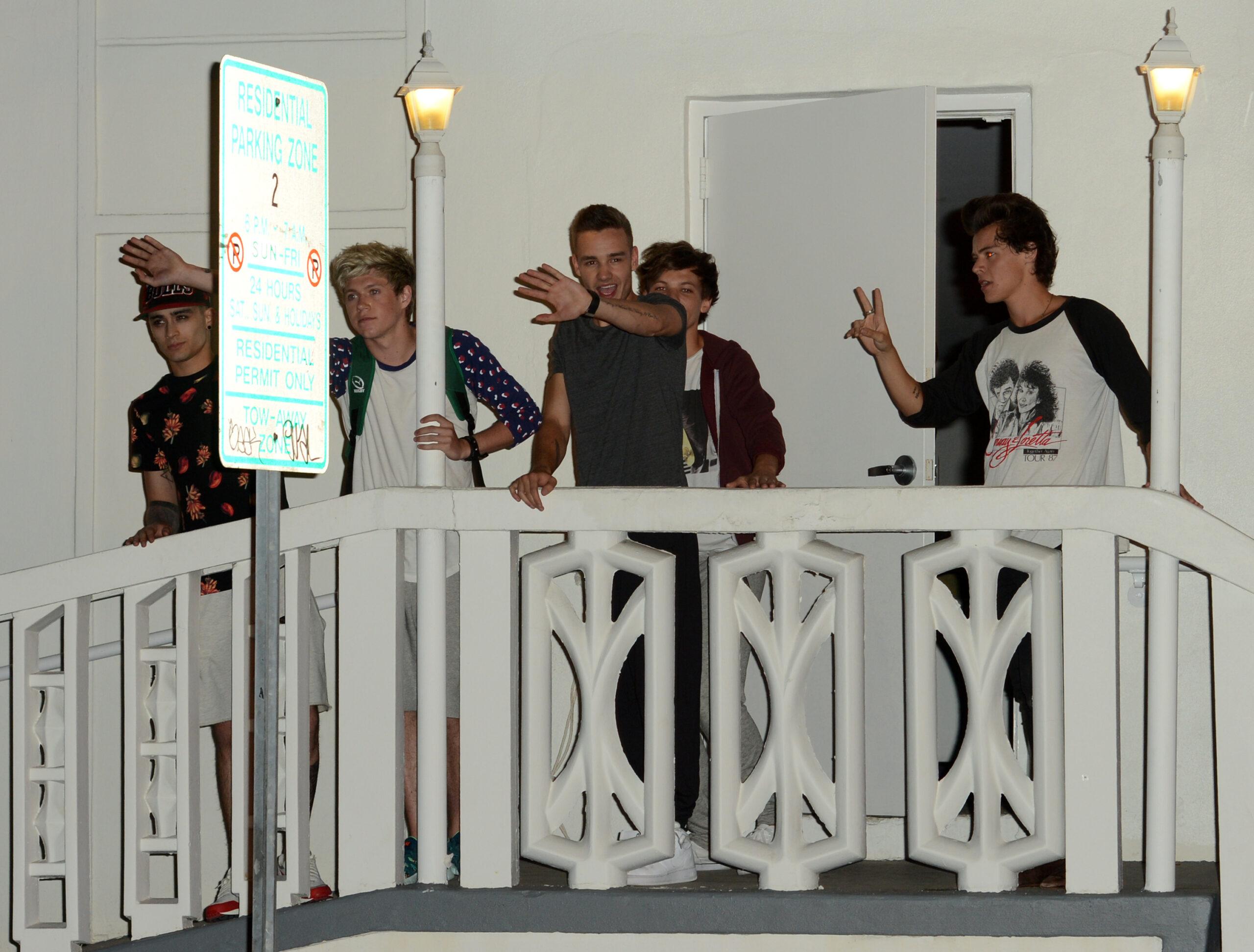 One Direction on a balcony