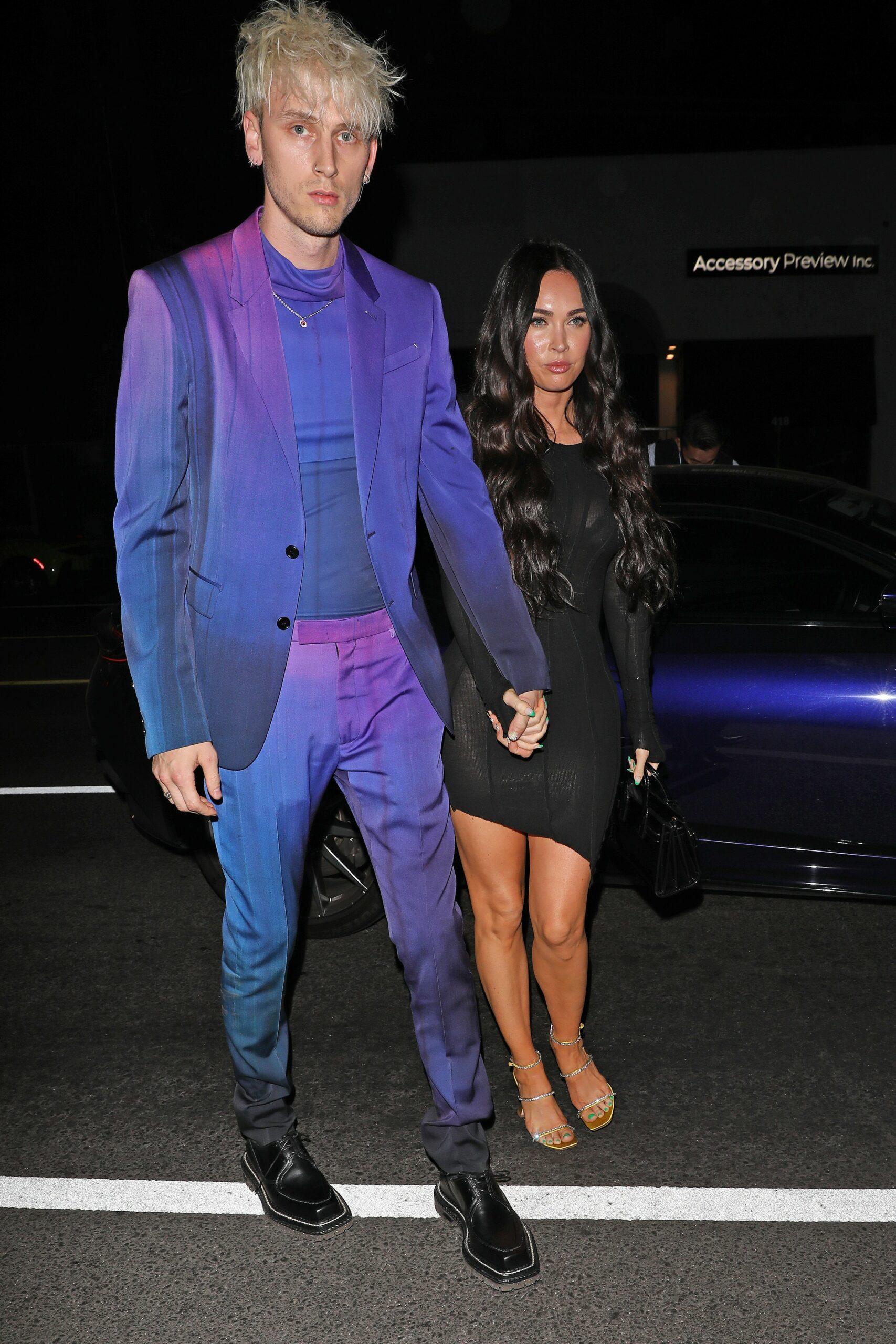 Megan Fox and Machine Gun Kelly walk hand in hand as they head to the Nice Guy Restaurant to party