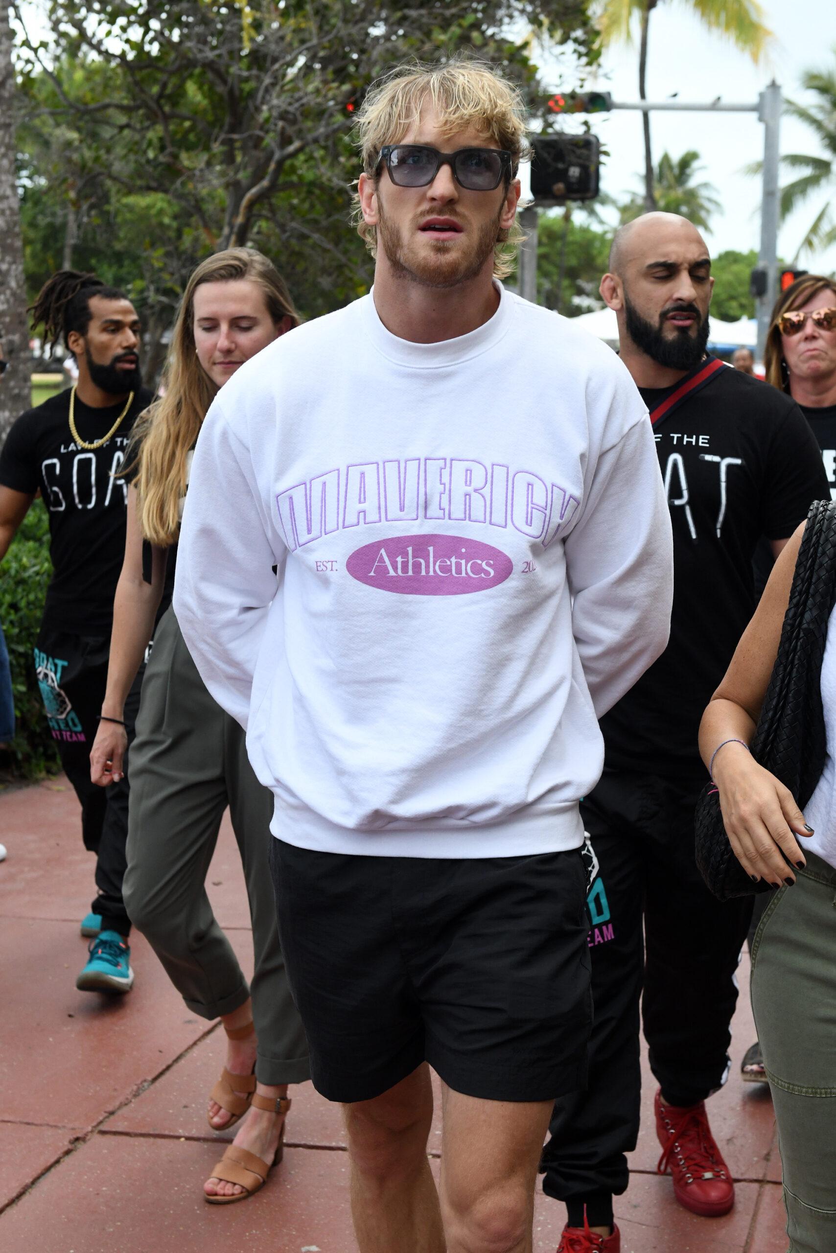 Logan Paul, and their entourages, arrive to Versace Mansion for a press conference before their big fight in Miami