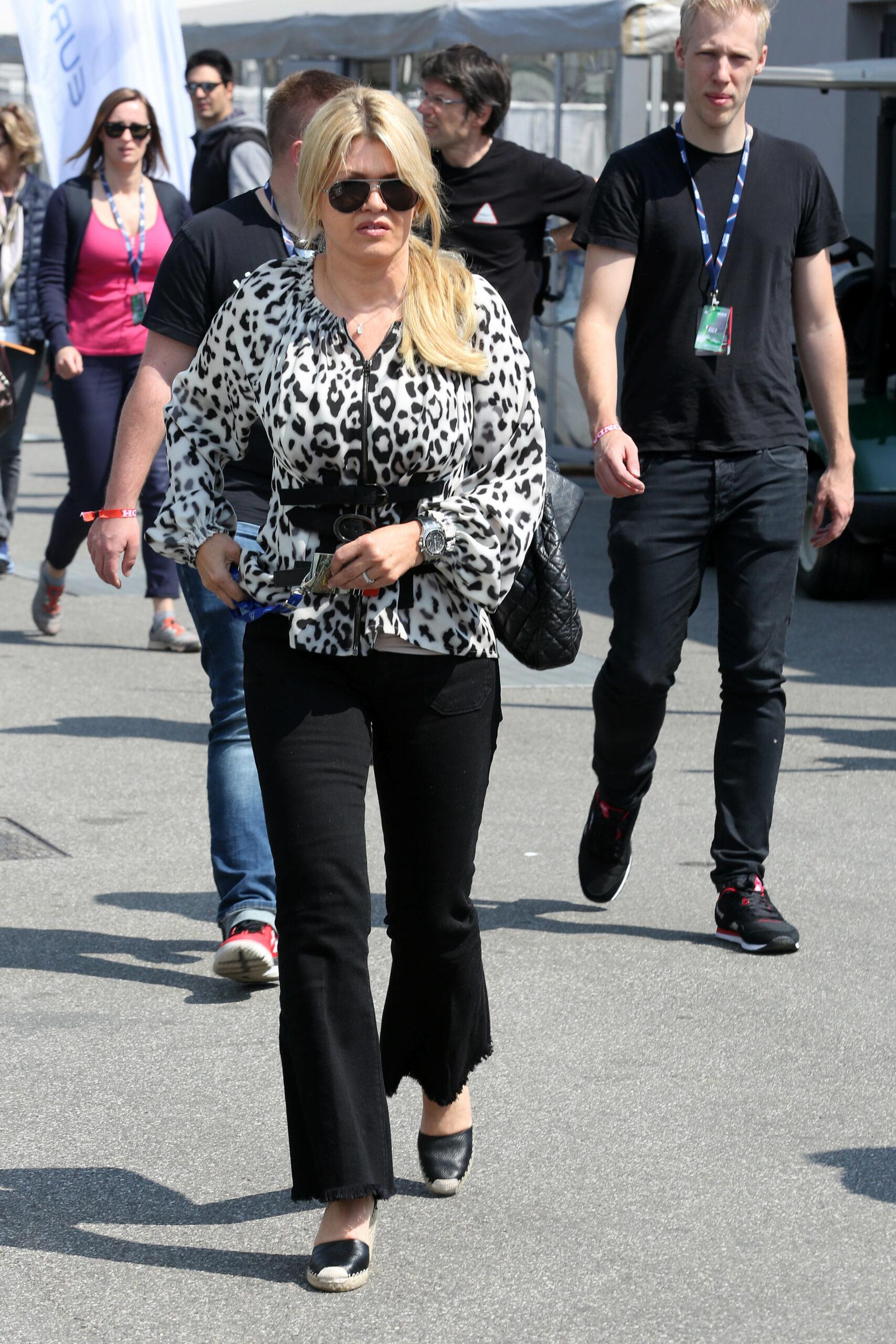 Corinna Schumacher with daughter Gina Maria and boyfriend in Monza