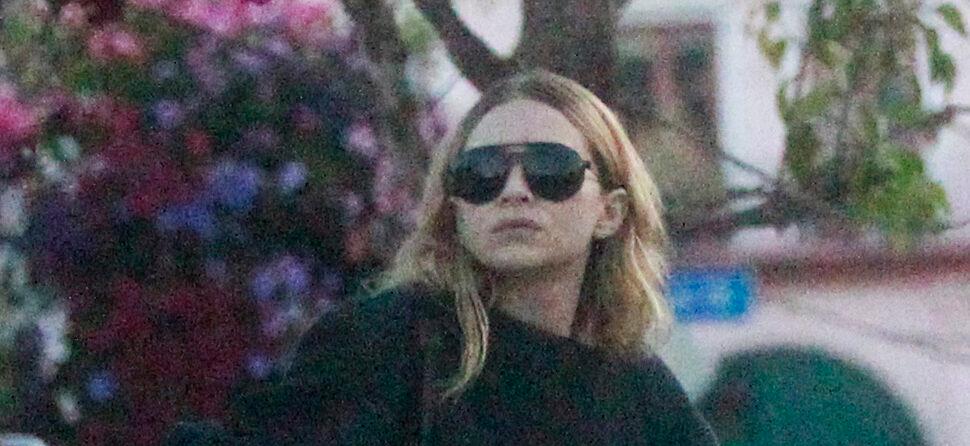 Ashley Olsen shows off a mystery engagement band while out with her Artist boyfriend Louis Eisner