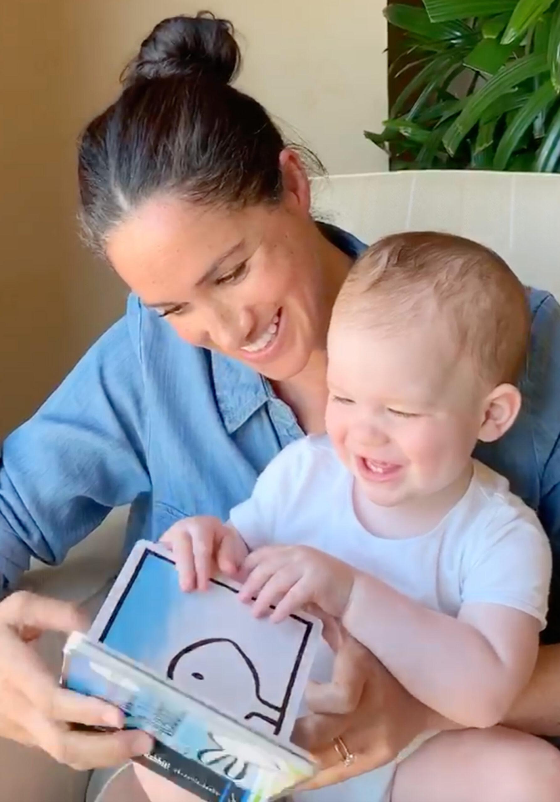 Meghan reads to Archie on his 1st Birthday