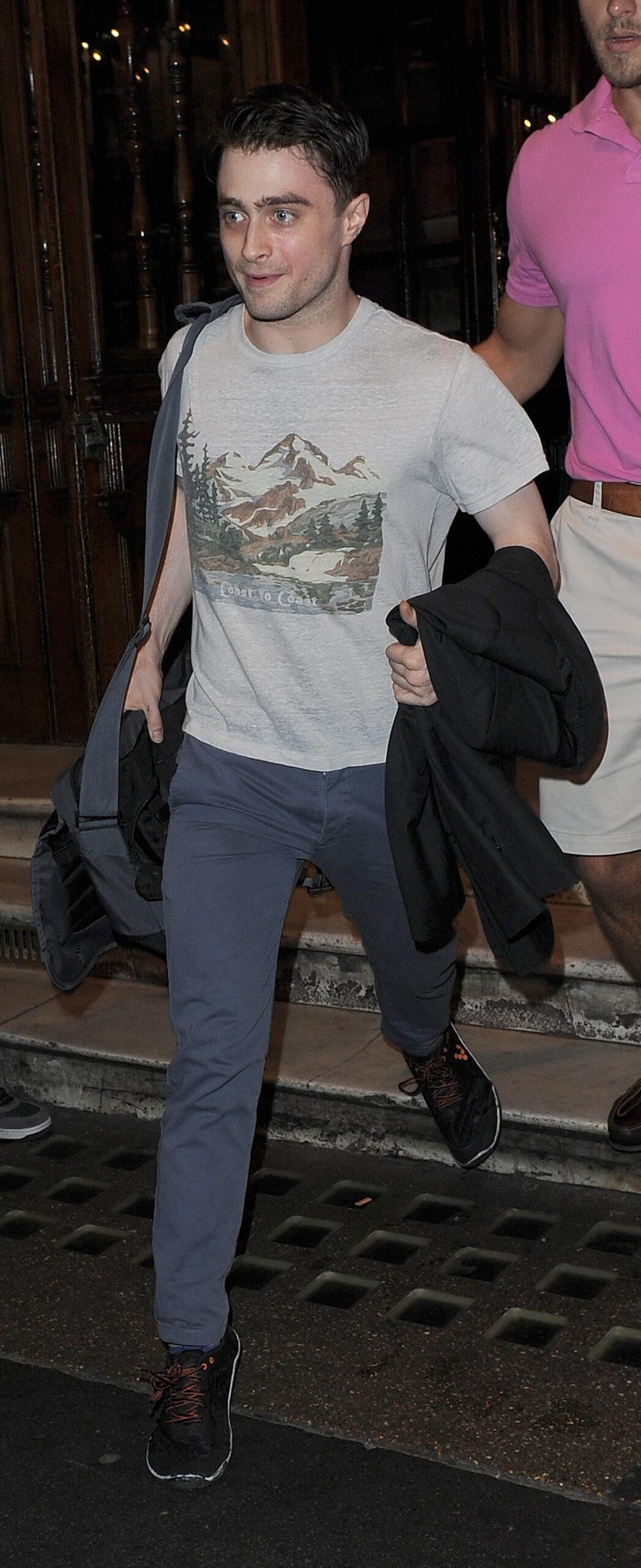 Daniel Radcliffe leaves the Noel Coward Theatre having performed in apos The Cripple Of Inishmaan apos The Harry Potter star was wearing blue trousers a grey t-shirt and black trainers He appeared rather wide eyed and sweaty