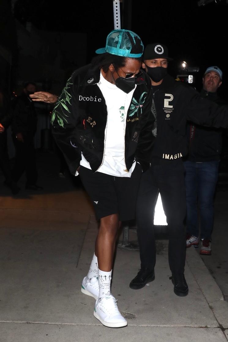 Jay-Z enters a Tesla leaving dinner at Giorgio Baldi