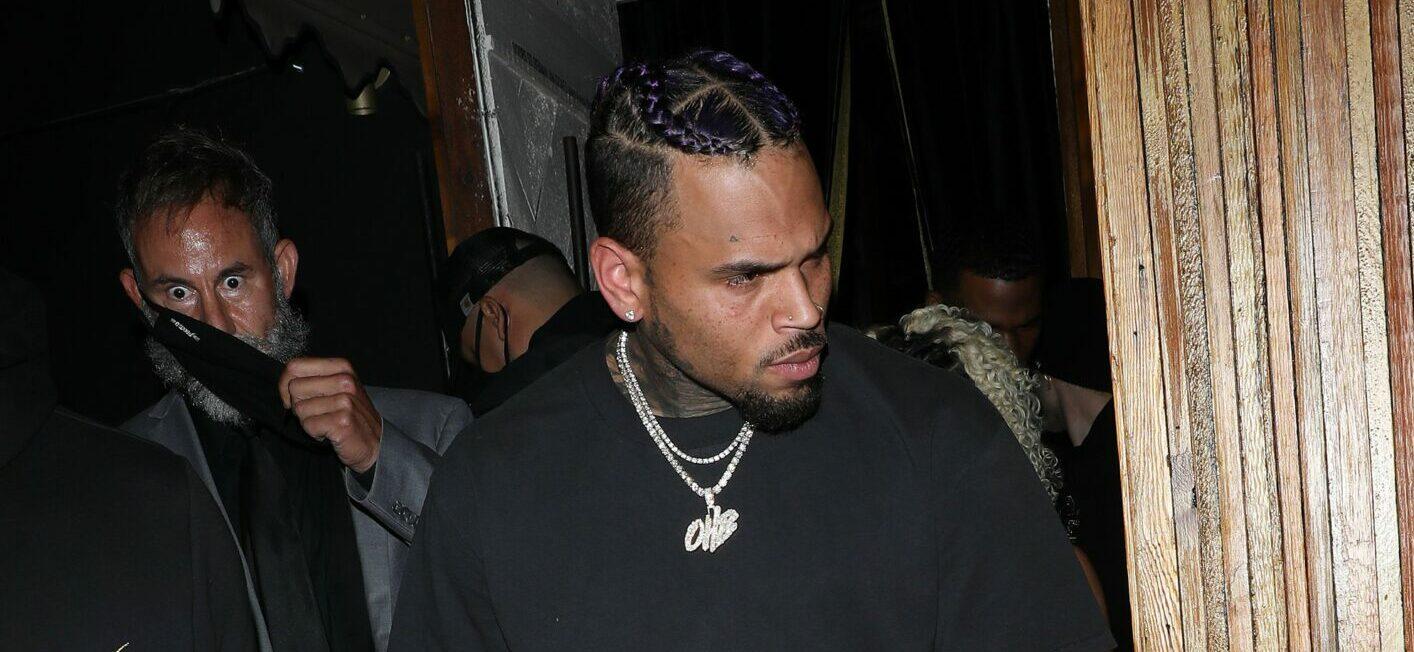 Singer Chris Brown is disappointed as he leaves the Nice Guy after a driver crashes into another car which hits his car