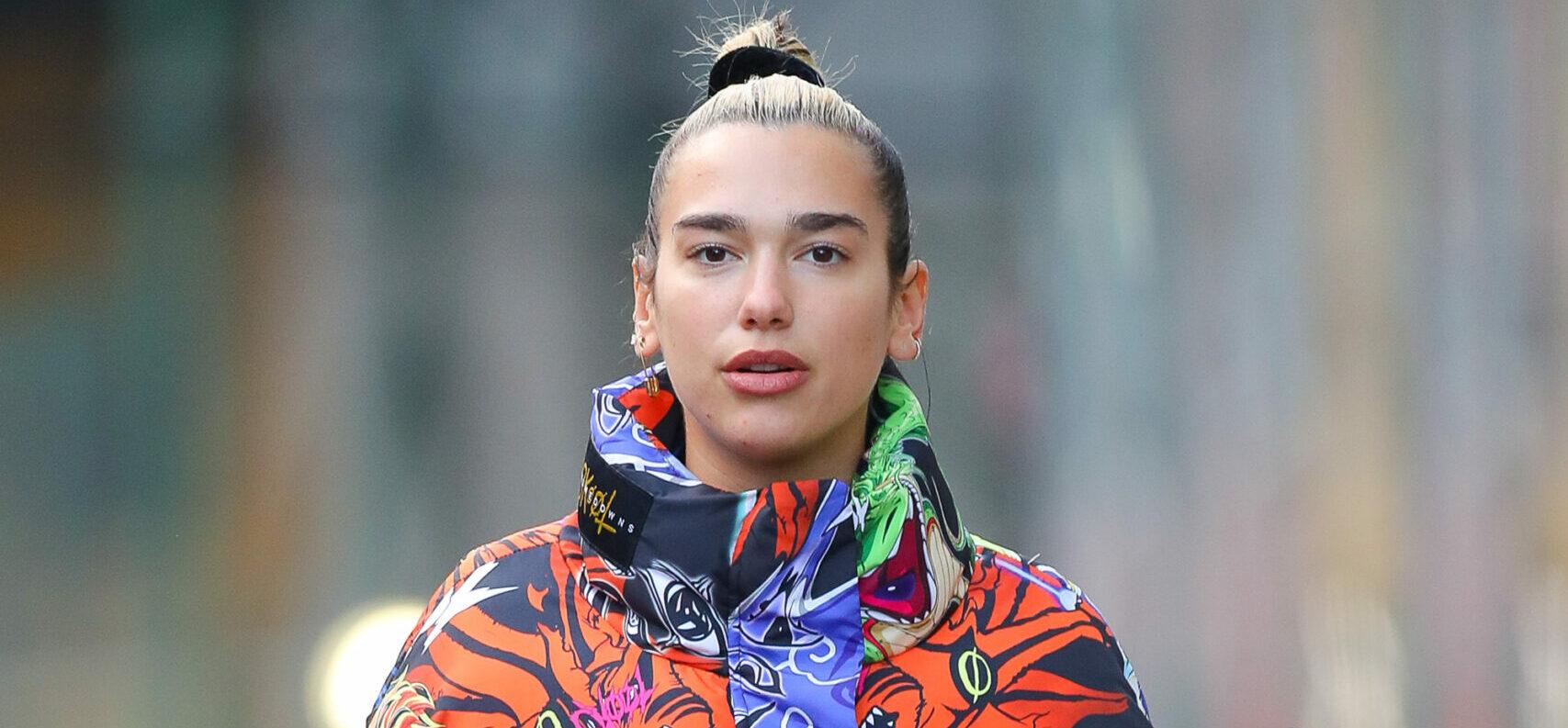 Dua Lipa sips into her water while walking around in NYC on Jan 10 2020
