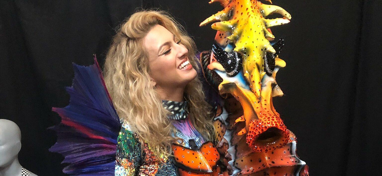Tori Kelly takes a photo with her Seahorse mask from The Masked Singer