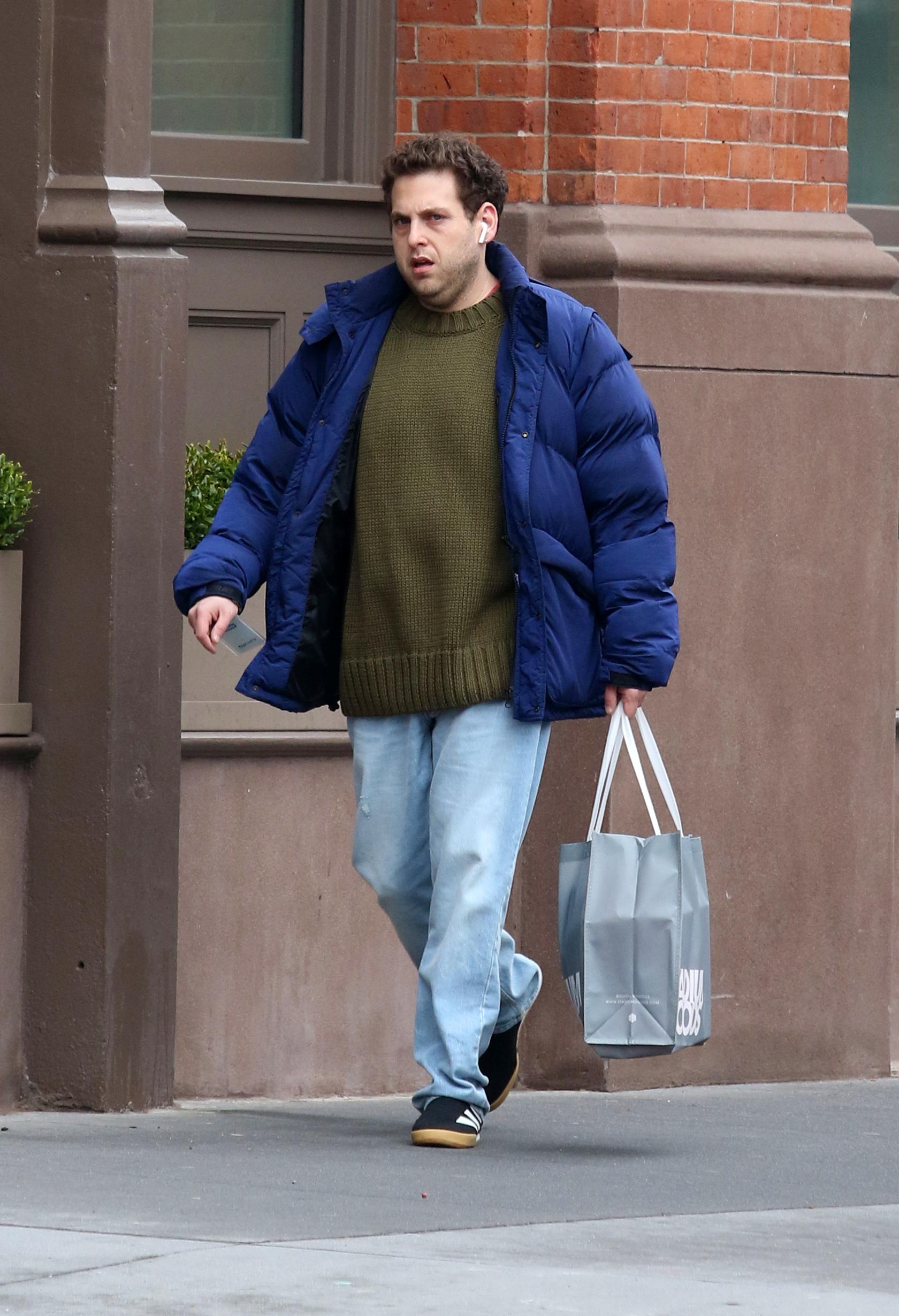 A photo of Jonah Hill taking a walk in New York City