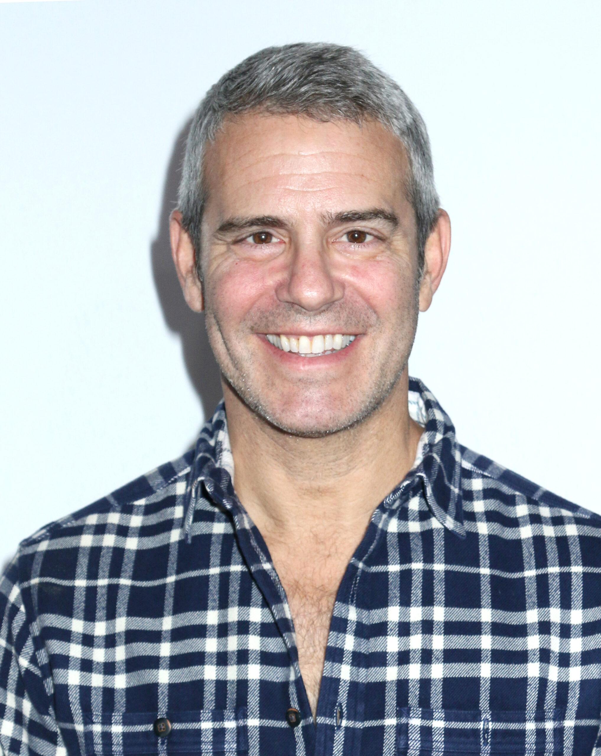 A photo showing Andy Cohen in a striped T-shirt.