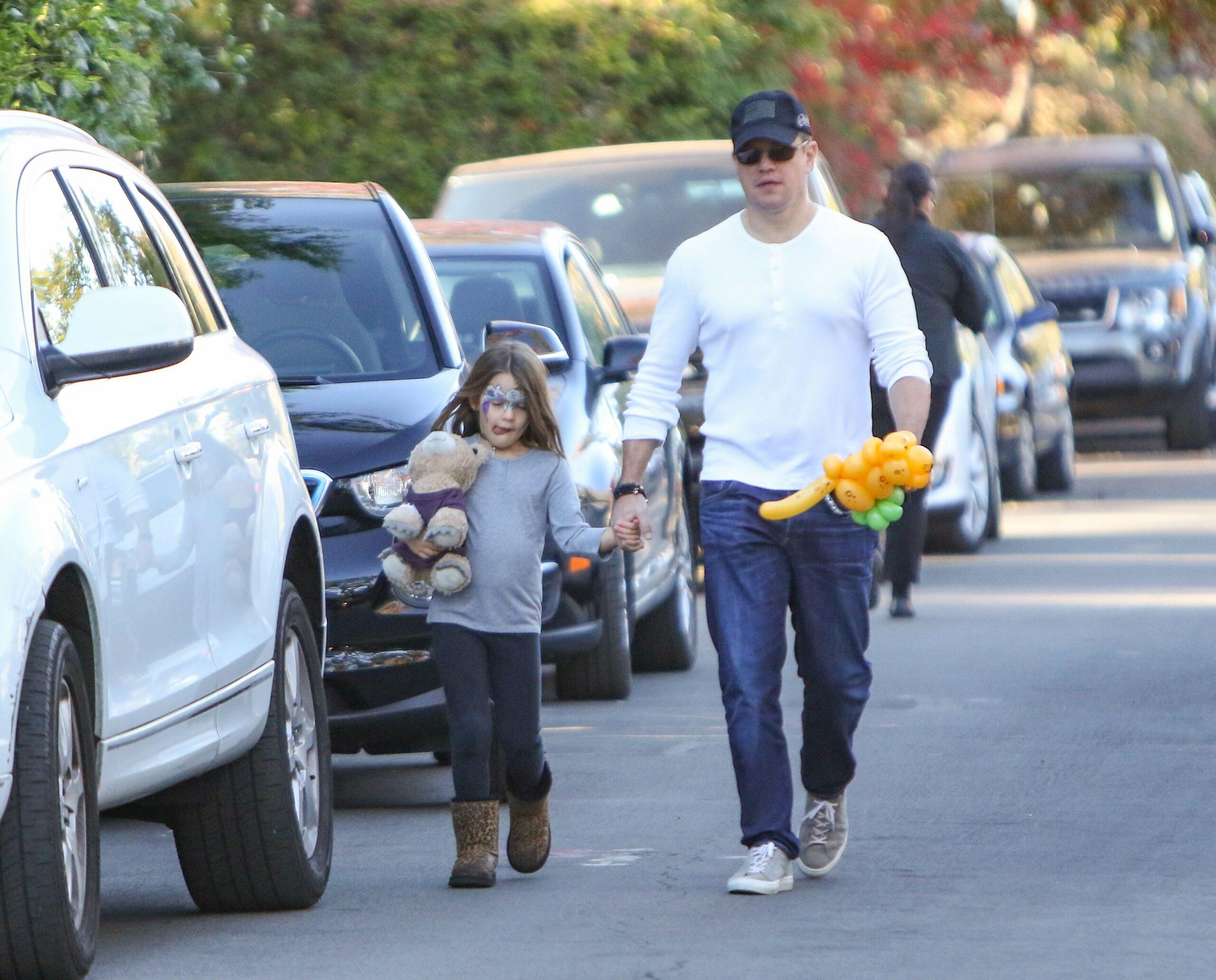 Matt Damon takes his daughter Stella to a birthday party in Los Angeles