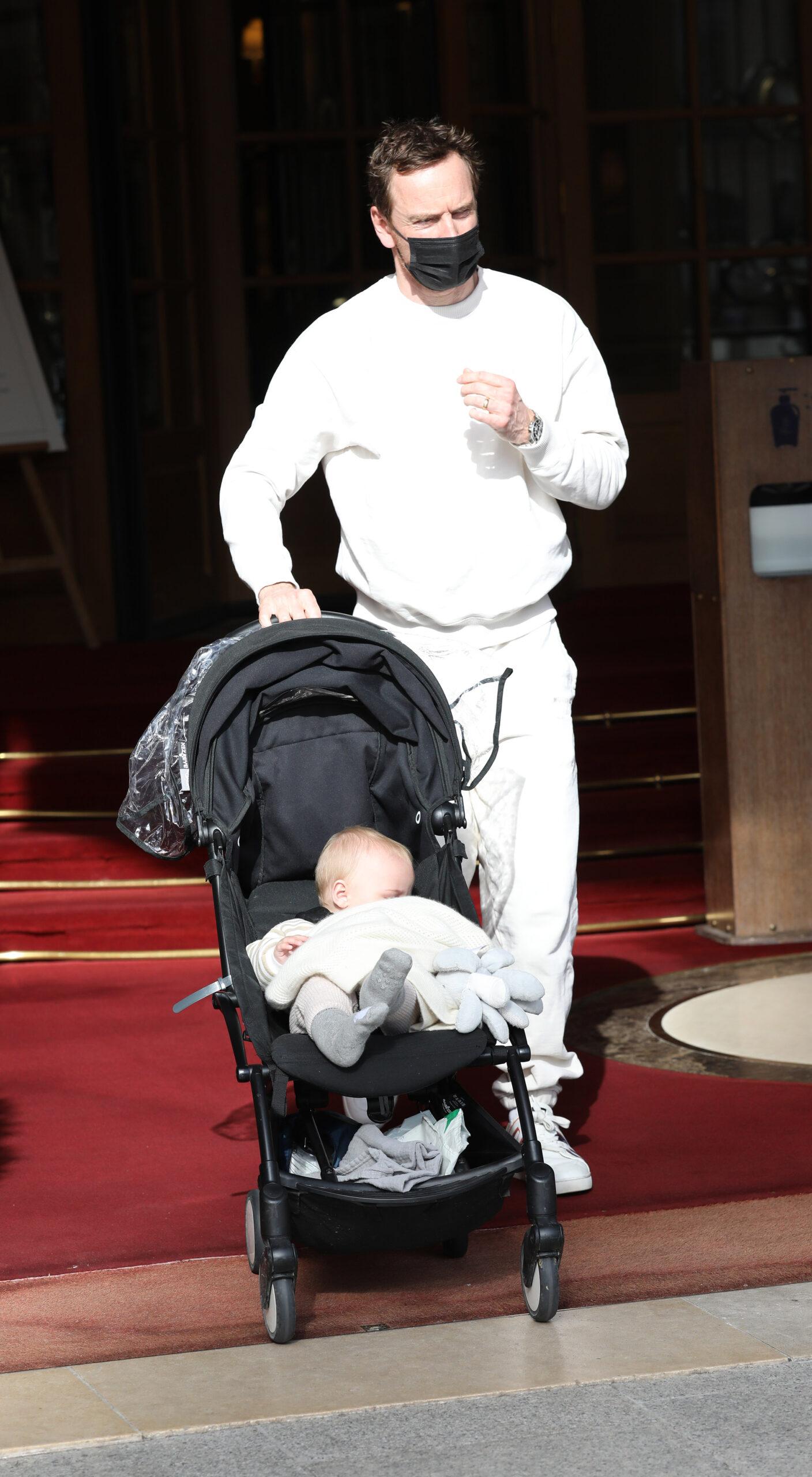 Michael Fassbender and his newborn baby in Paris during the Fashion Week