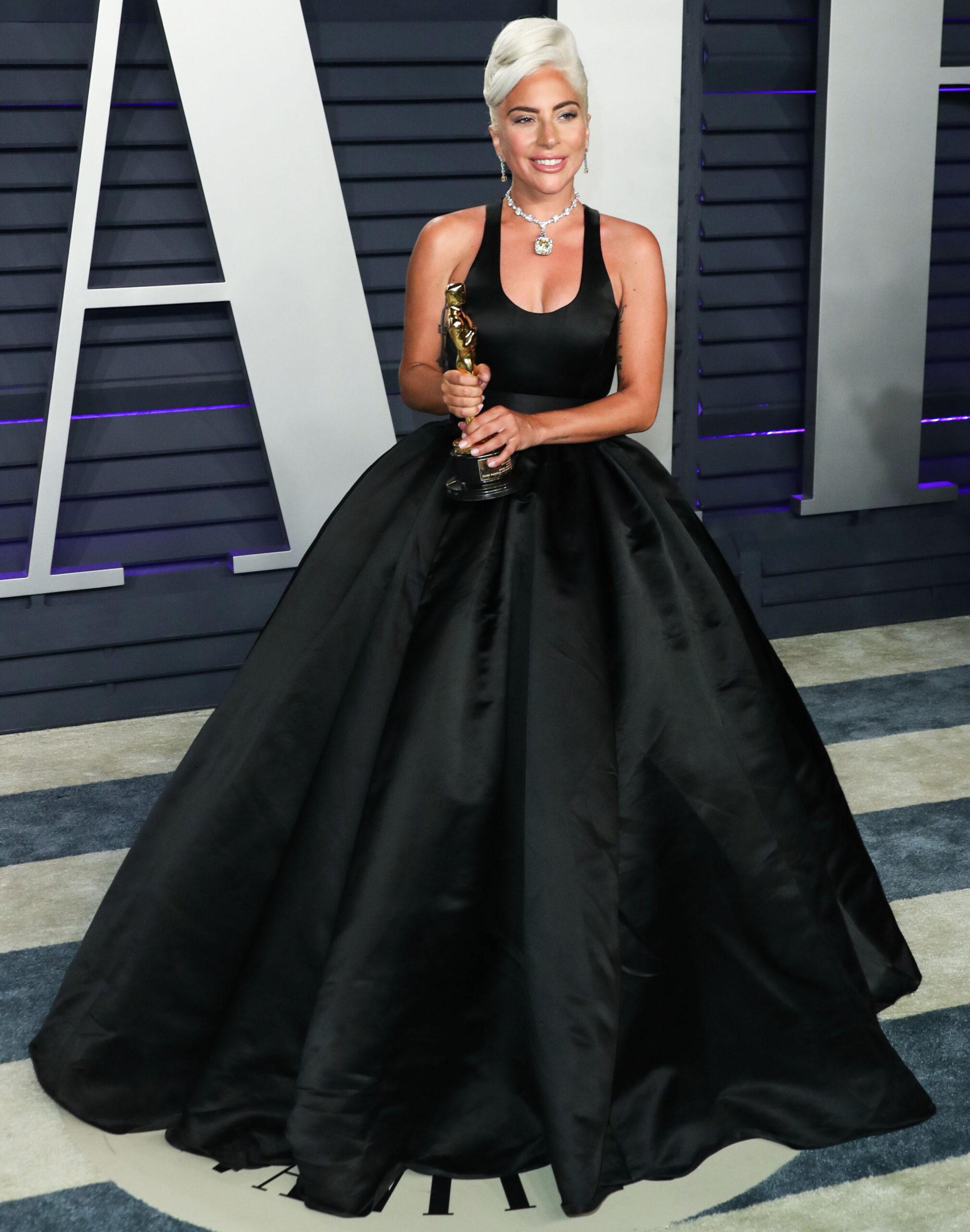 Lady Gaga holding Oscar