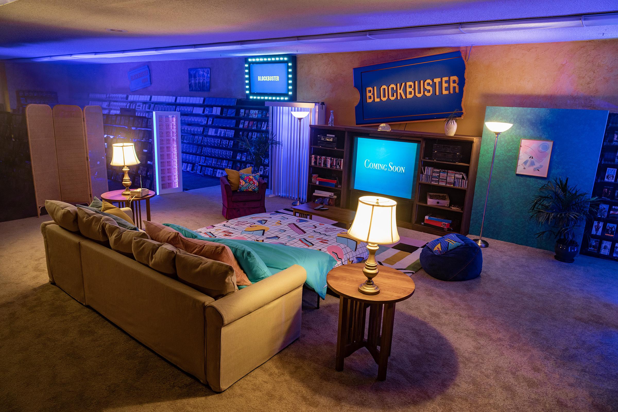 The world's last remaining Blockbuster video rental store has been turned into an Airbnb. Fans who stay will be able to get unlimited access to the shop's huge range of film titles, and will have a TV and a pull-out couch to watch them on. The 20-year-old store in Bend, Oregon, in the United States, is the last remaining store in the once hugely popular video rental chain. The store rents film titles at $3.99 USD - and a stay is just $4 USD, plus taxes and fees. Store manager Sandi Harding has converted a section of the store for the “End of Summer Sleepover”, which will allow film lovers to access the store for three one-night stays in September. It has been listed on holiday accommodation site, Airbnb for local residents. "This end of summer sleepover will offer movie lovers in Deschutes County, Oregon the chance for a 90s-themed stay to relive the bygone Friday night tradition just as we remember it," they said. "As the Airbnb host, Sandi will stock the shelves with all the movies a heart could desire before handing over the keys." At its peak, Blockbuster had over 9000 stores around the world. In December 2013, the long-running rental chain called in administrators in the UK. Please credit AIRBNB/MEGA. 12 Aug 2020 Pictured: Inside the Airbnb. Photo credit: AIRBNB/MEGA TheMegaAgency.com +1 888 505 6342 (Mega Agency TagID: MEGA693817_003.jpg) [Photo via Mega Agency]